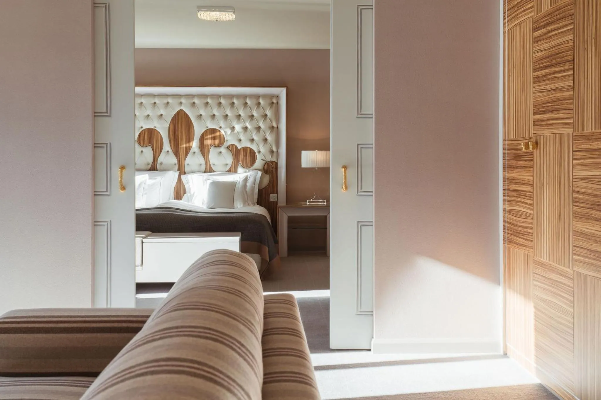 Living room, Bed in Carlton Hotel St Moritz - The Leading Hotels of the World