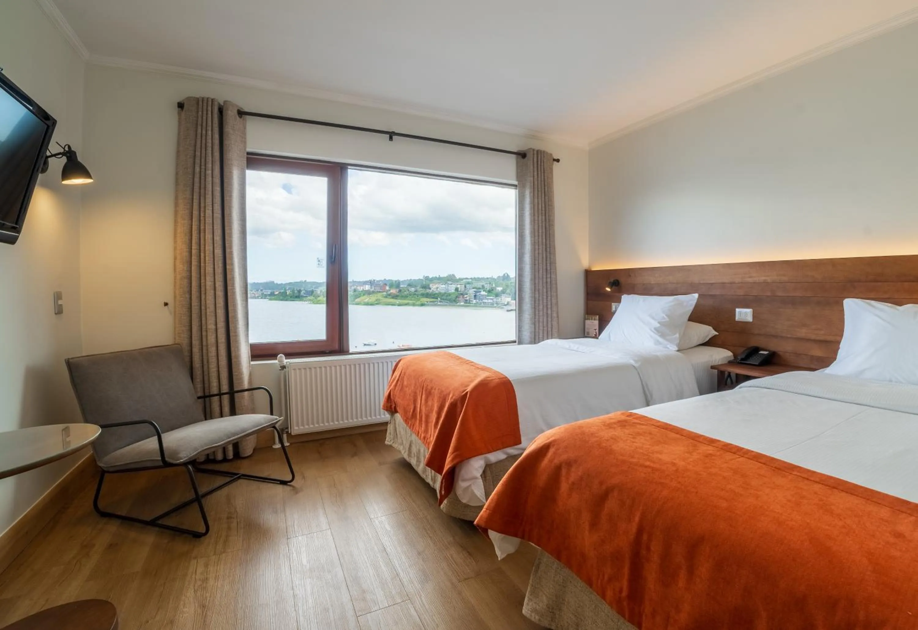 Photo of the whole room, Bed in Hotel Cabaña Del Lago Puerto Varas