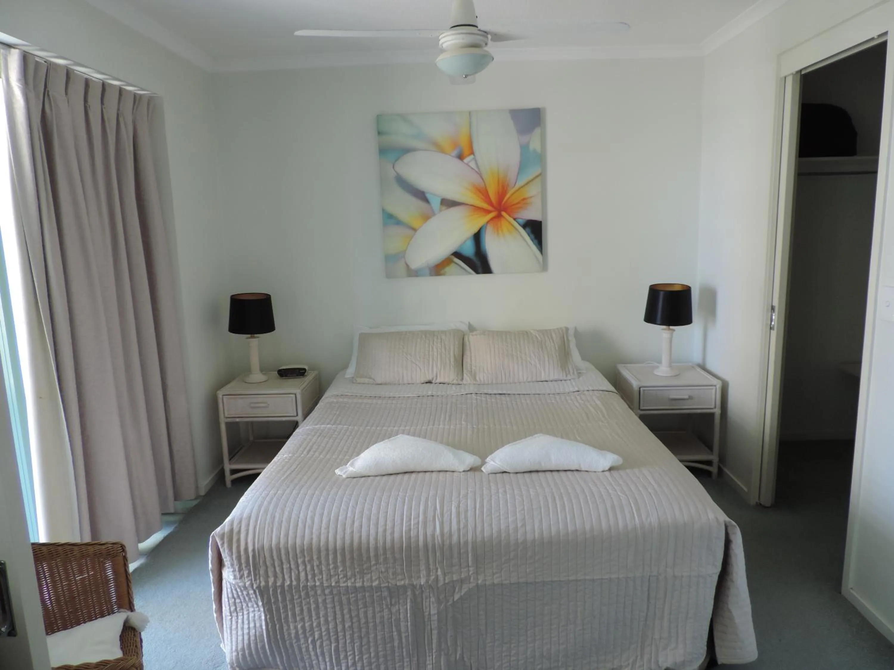 Bed in Emerald Sands Holiday Apartments