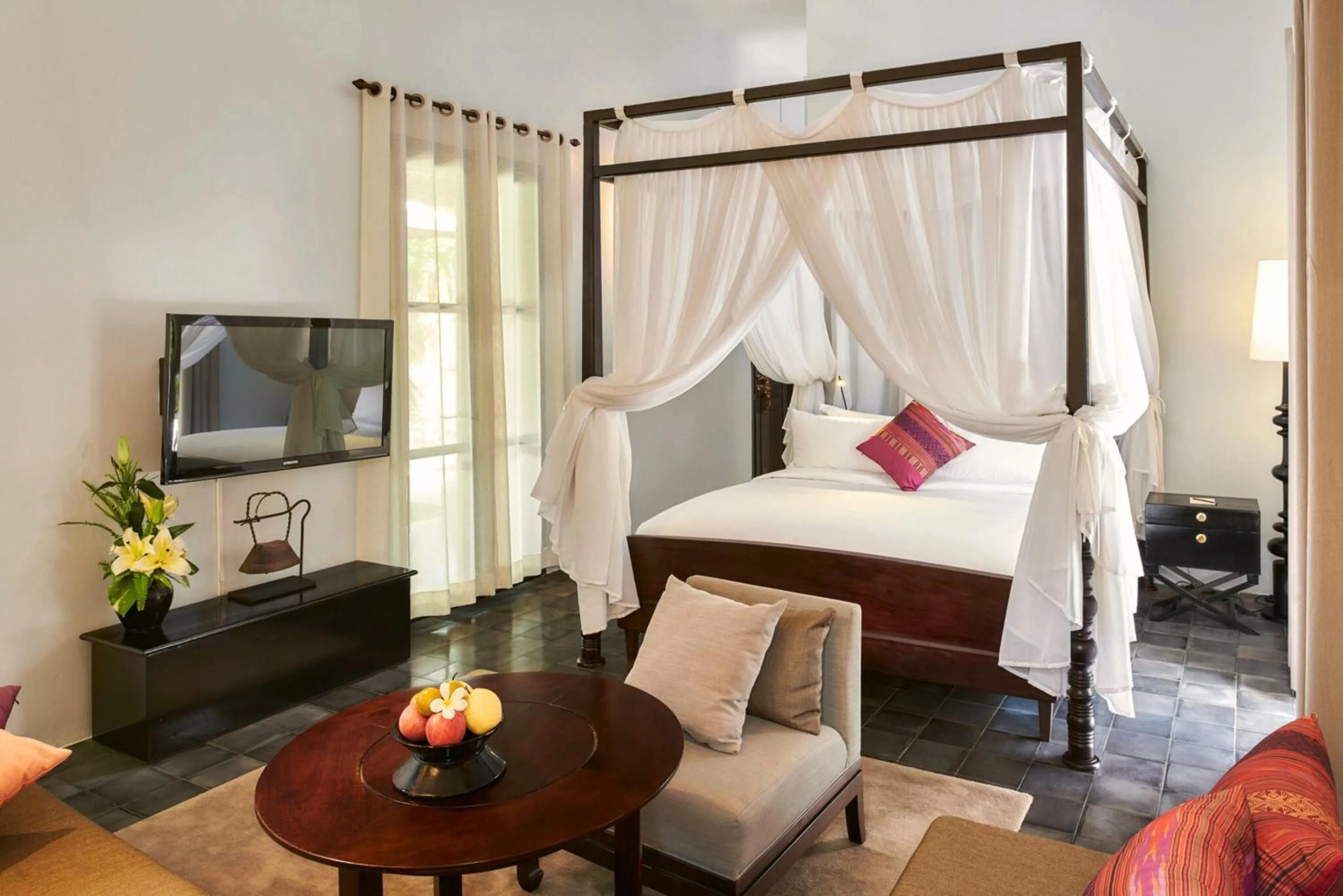 Photo of the whole room, Bed in Sofitel Luang Prabang