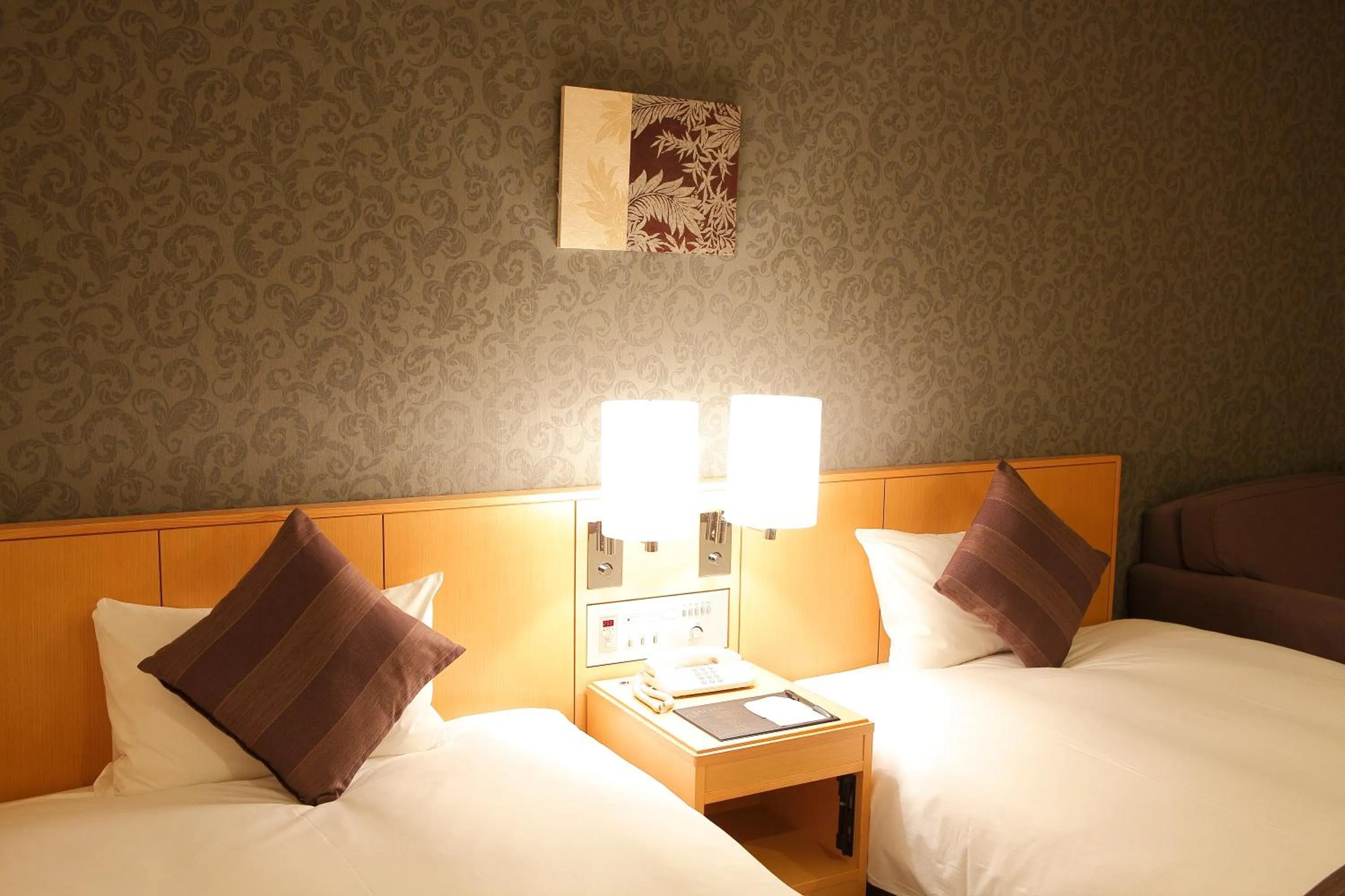 Bed in Hotel Granvia Wakayama