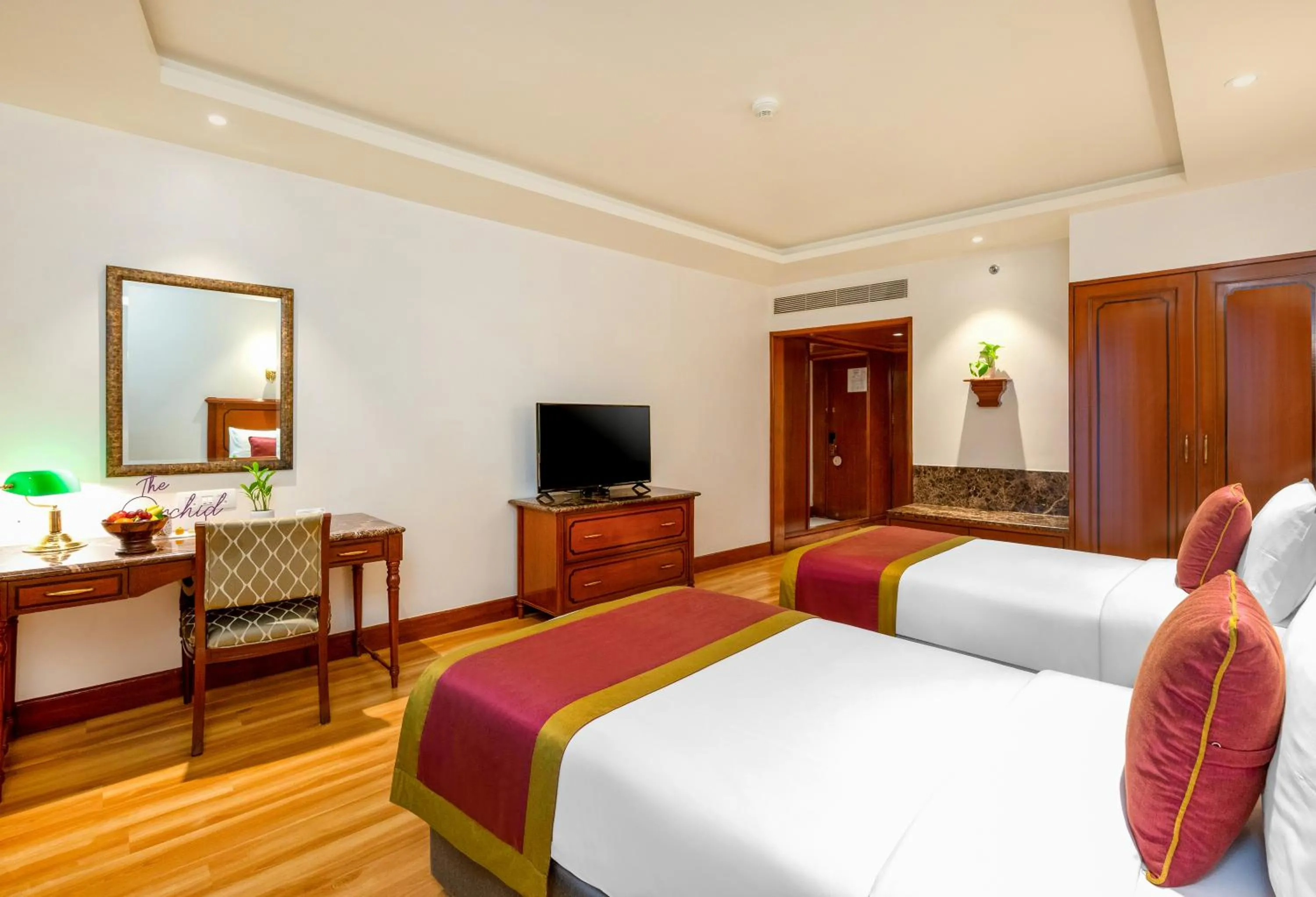 Bed in The Orchid Hotel Mumbai Vile Parle