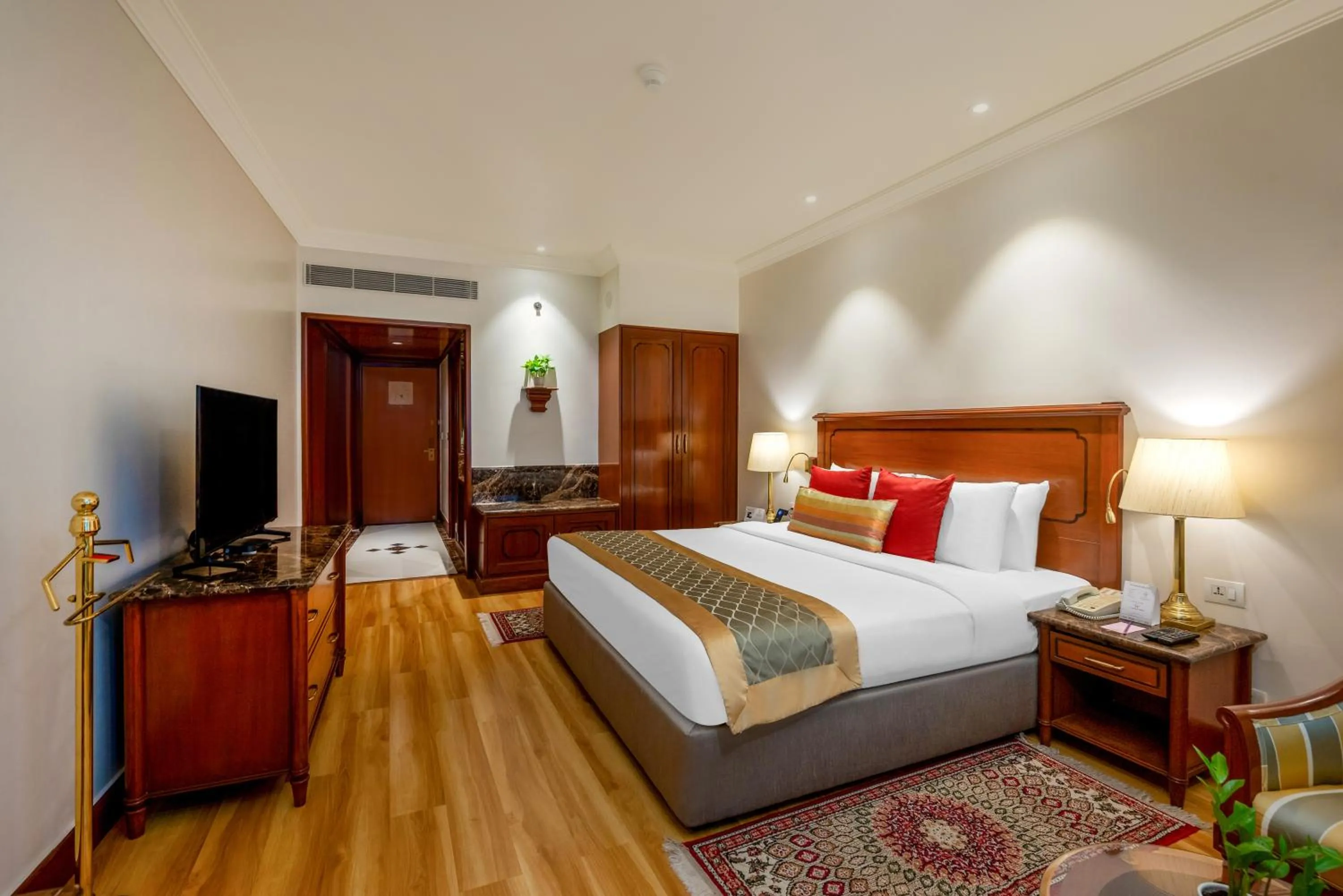 Bed in The Orchid Hotel Mumbai Vile Parle