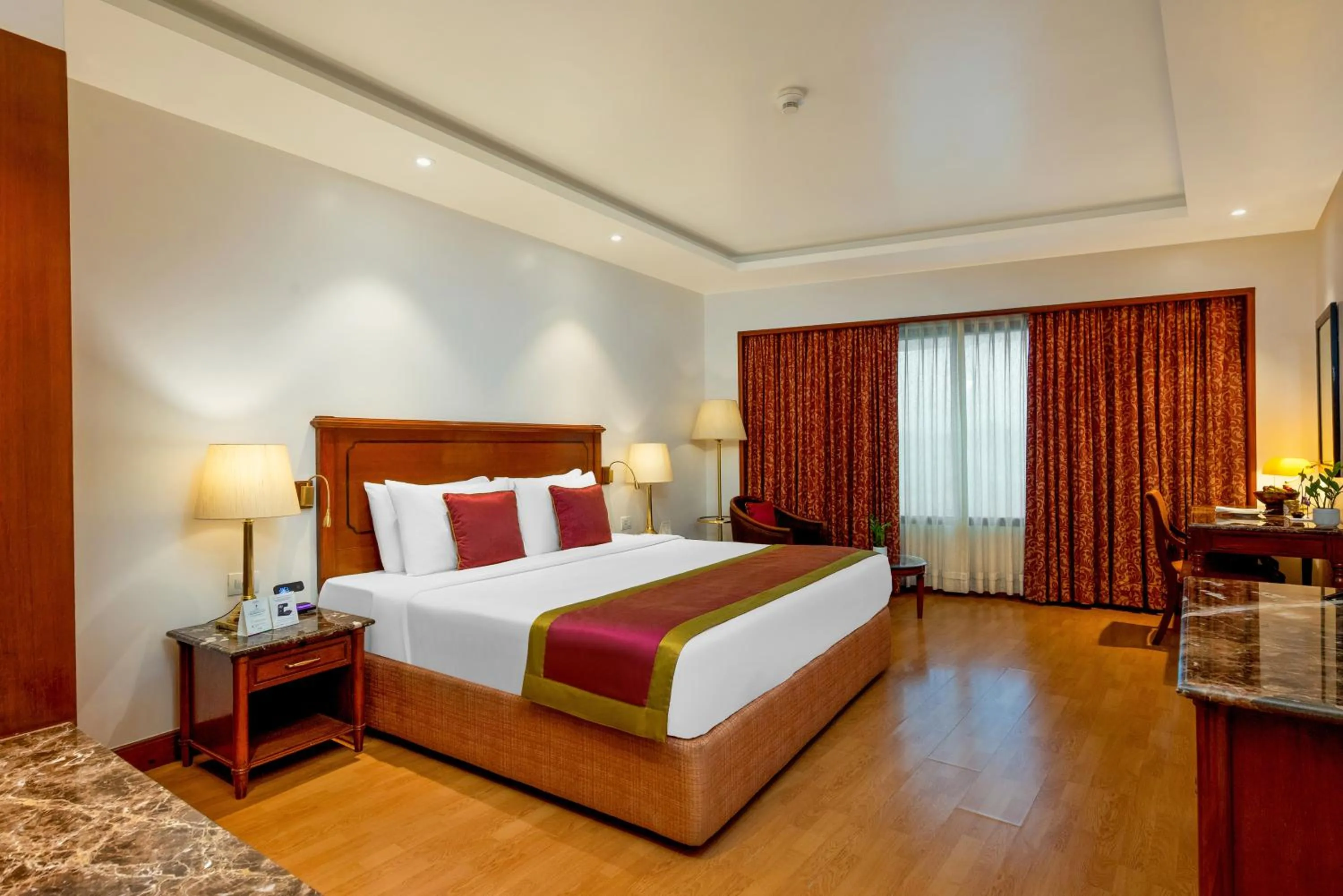 Bed in The Orchid Hotel Mumbai Vile Parle