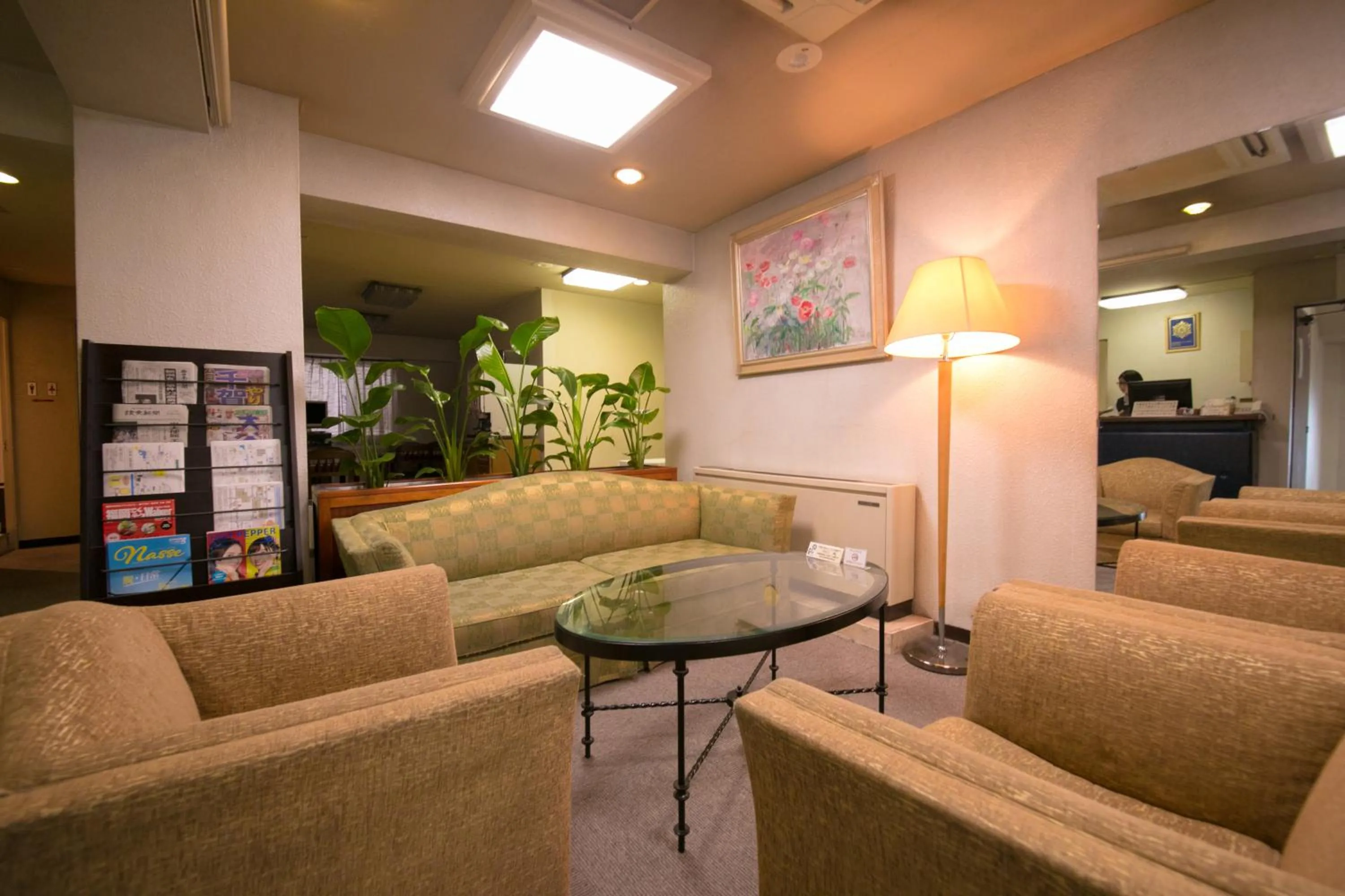 Communal lounge/ TV room in Heiwadai Hotel Arato