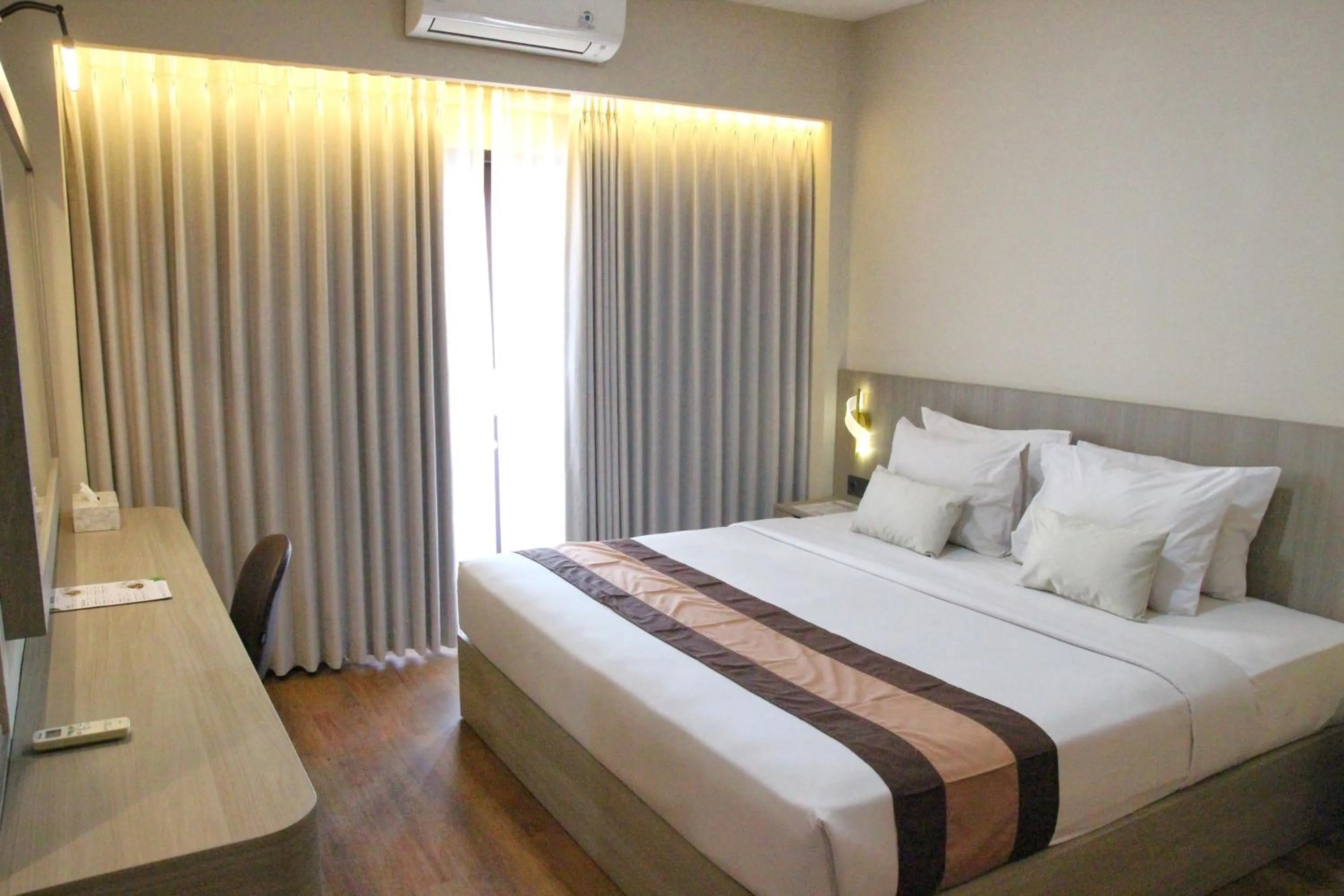 Bedroom, Bed in Grand Santhi Hotel