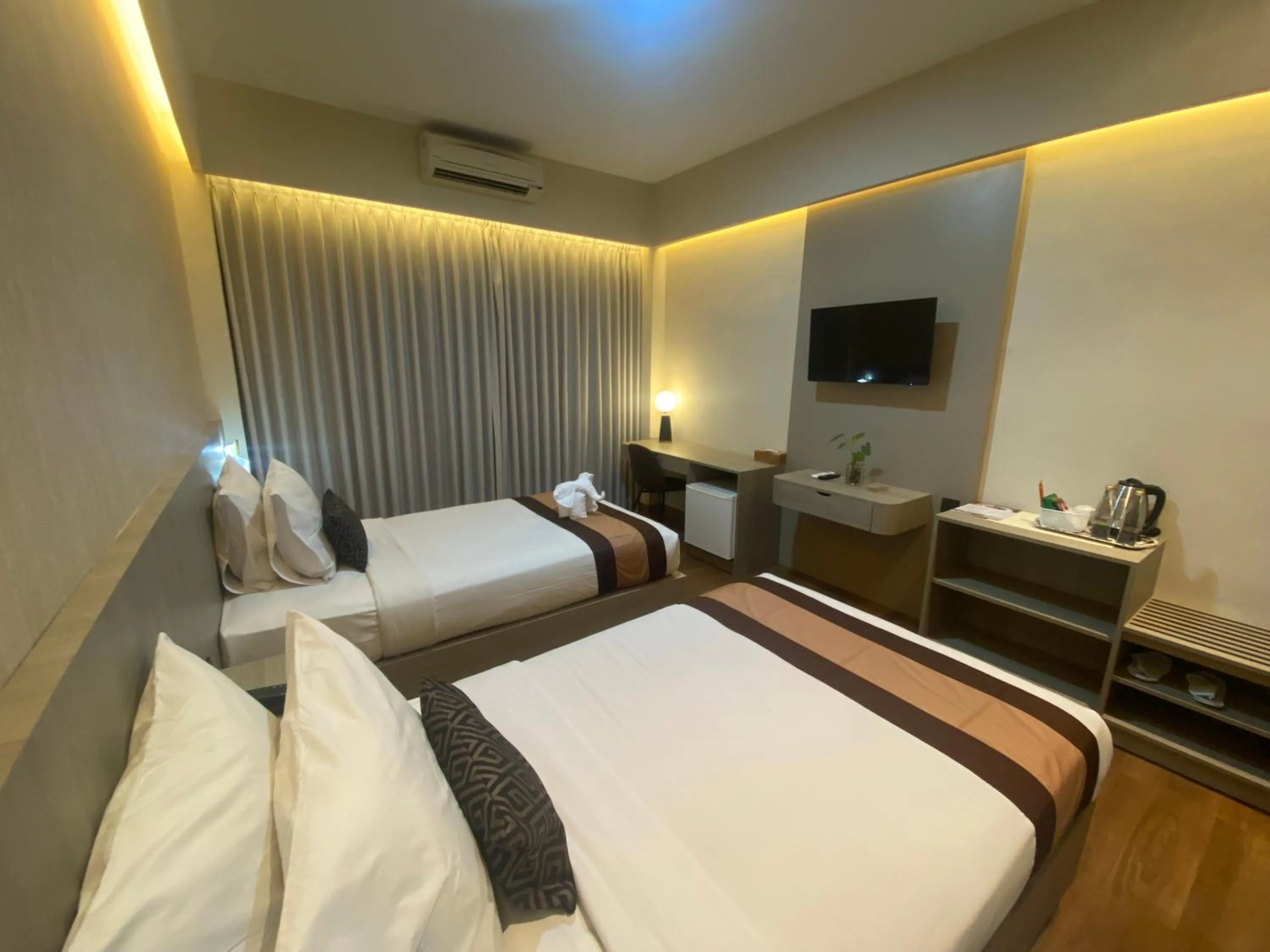Bedroom, Bed in Grand Santhi Hotel