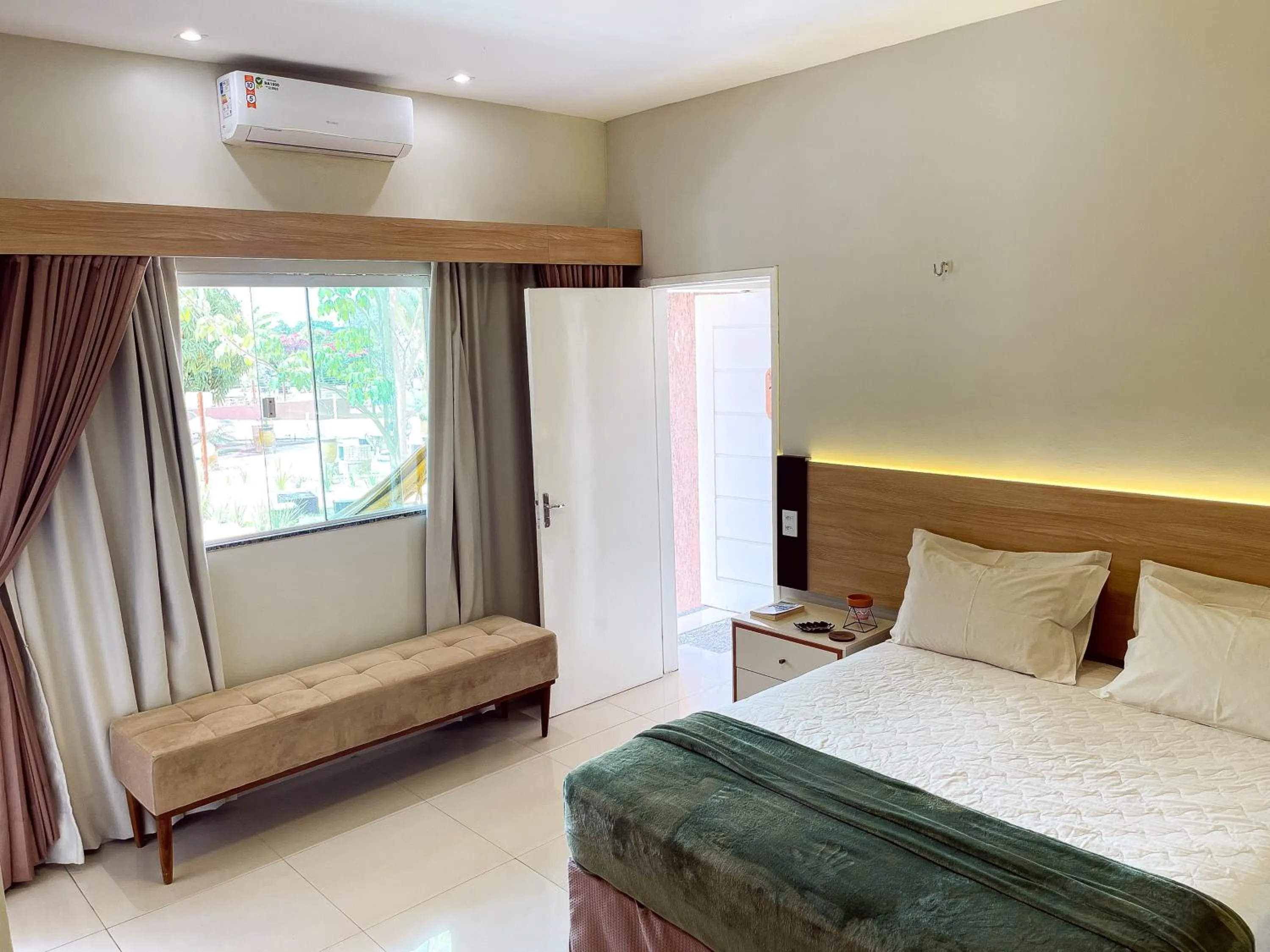 Bedroom in Muda Hotel