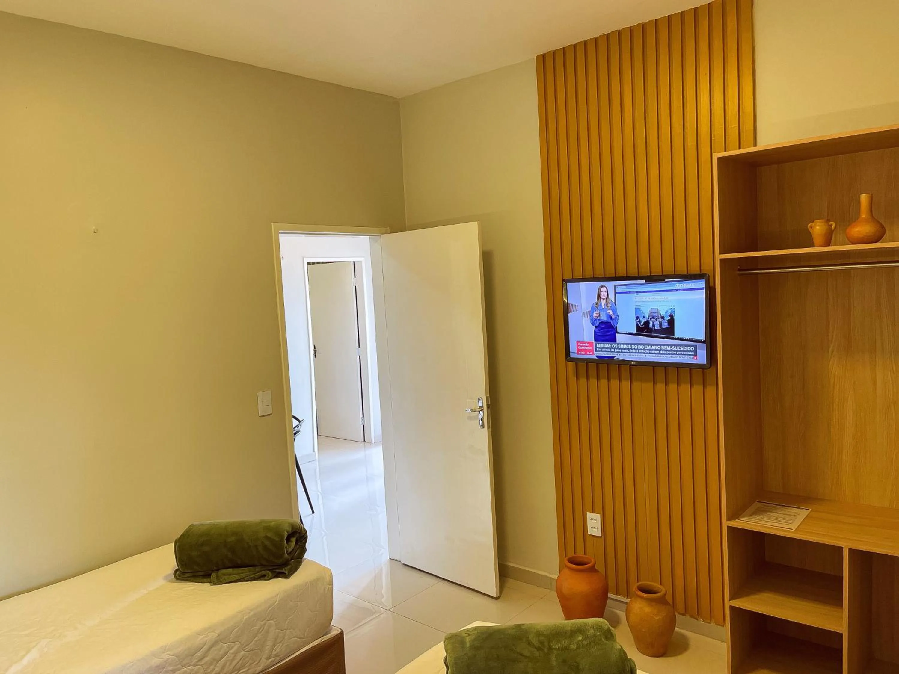 Bedroom in Muda Hotel