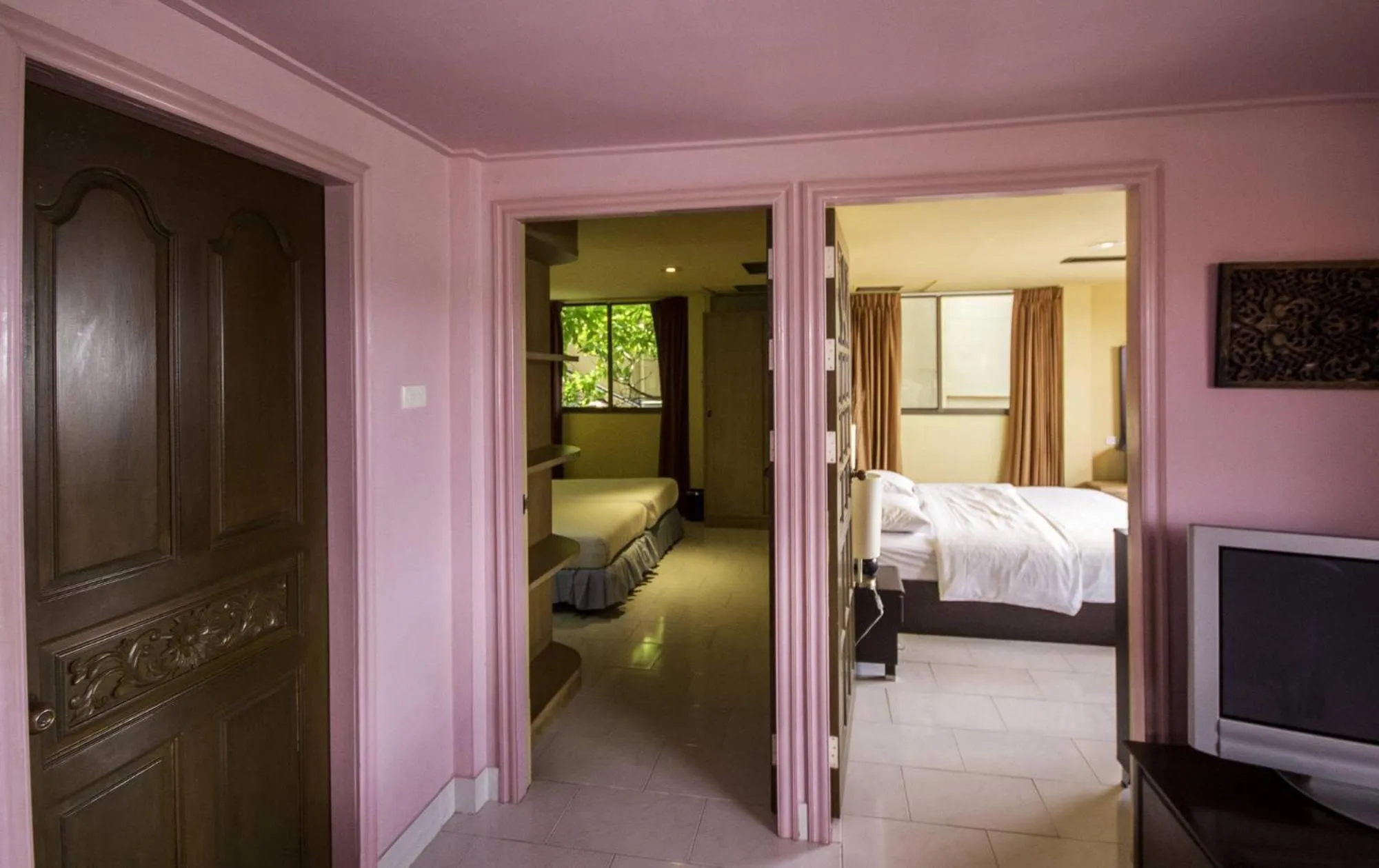 Bed in Bougainvillea Terrace House