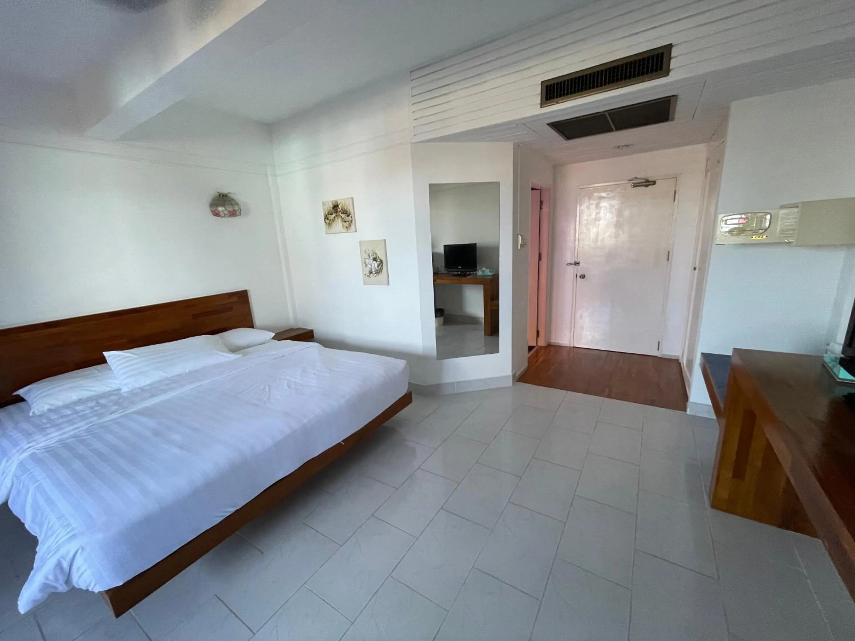 Bed in Bougainvillea Terrace House