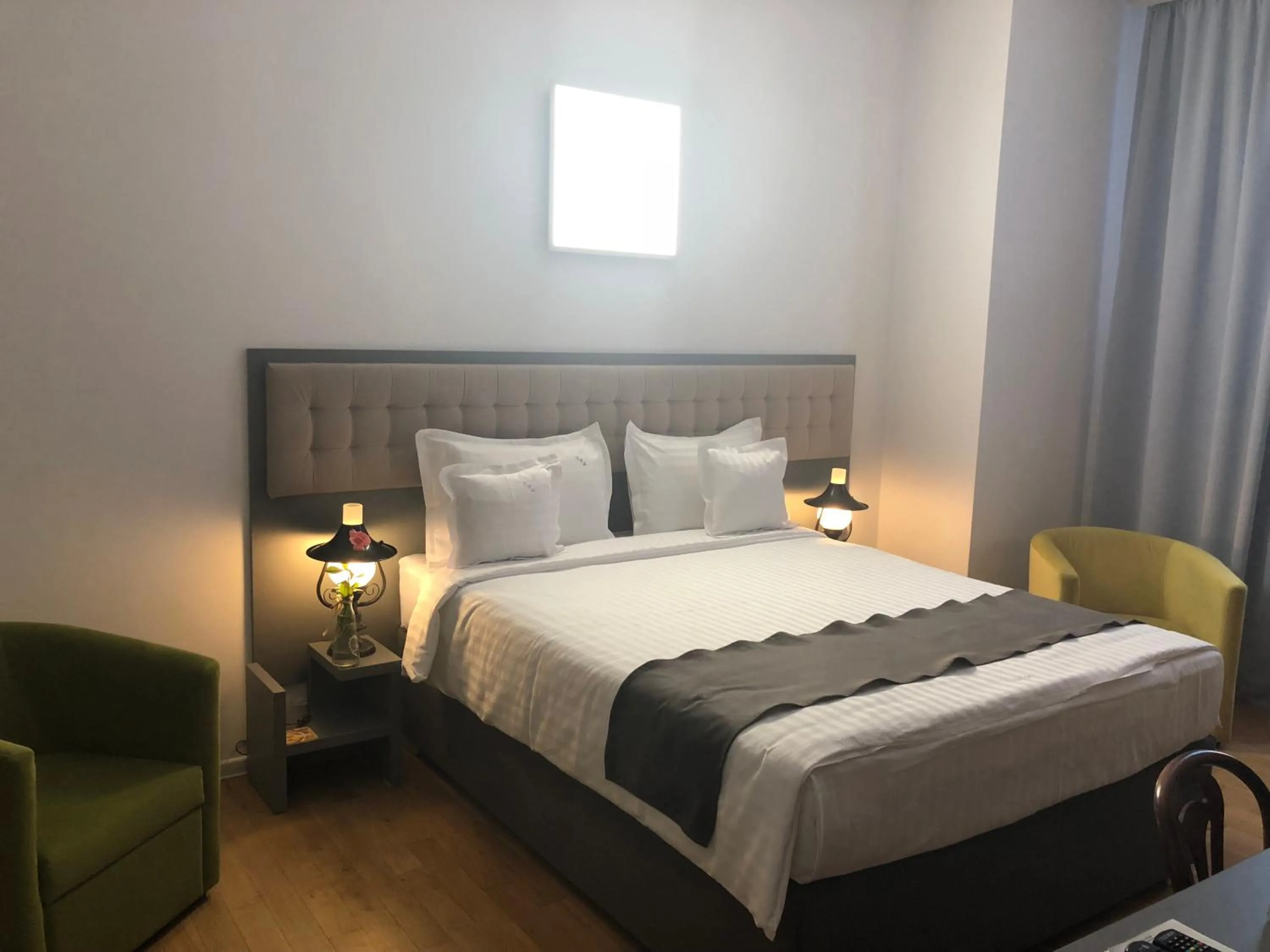 Bed in Ambra Boutique Hotel & Bistro