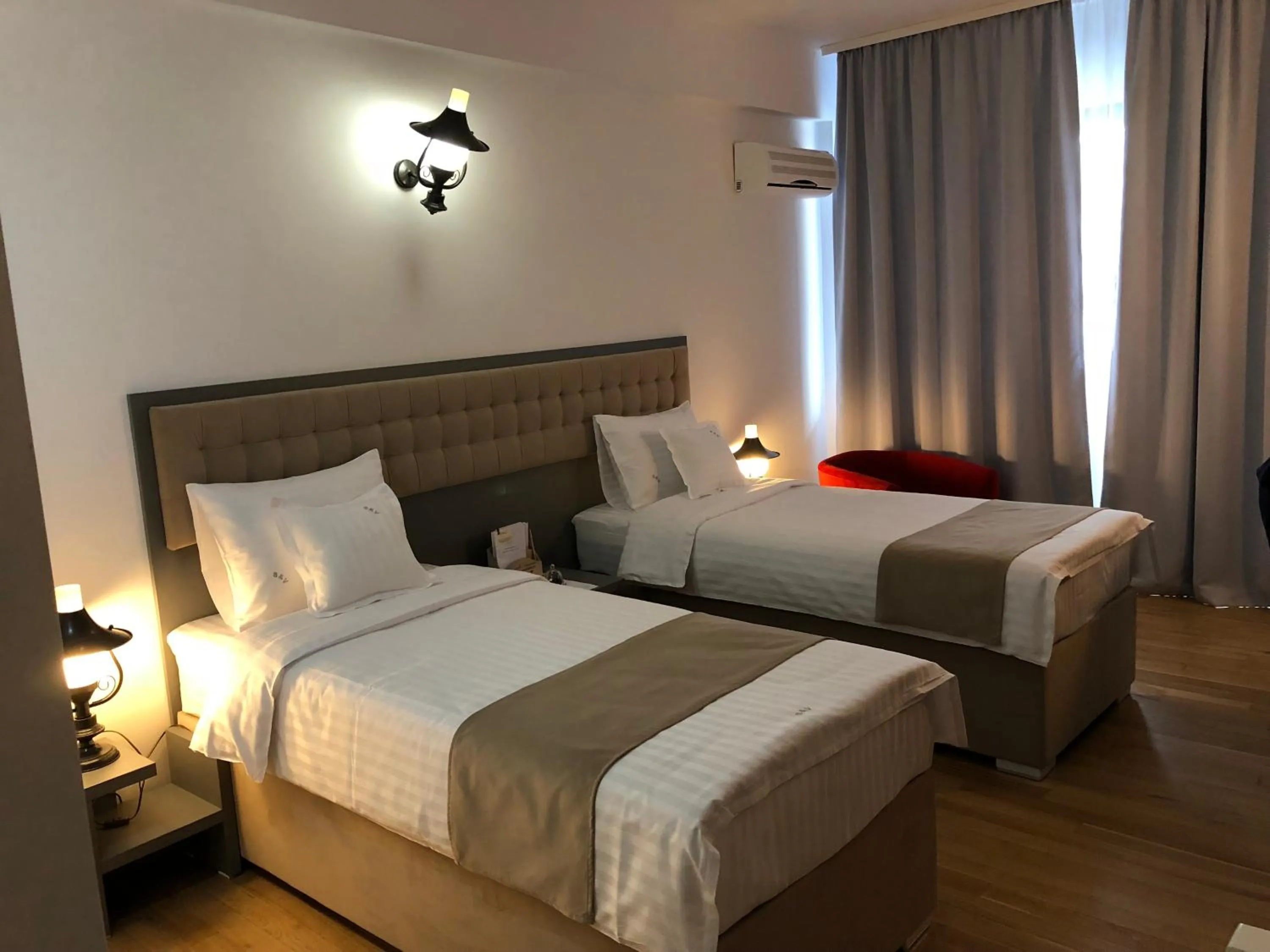 Bed in Ambra Boutique Hotel & Bistro