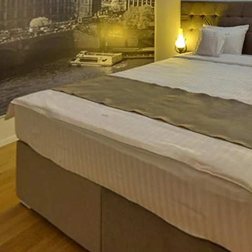 Bed in Ambra Boutique Hotel & Bistro