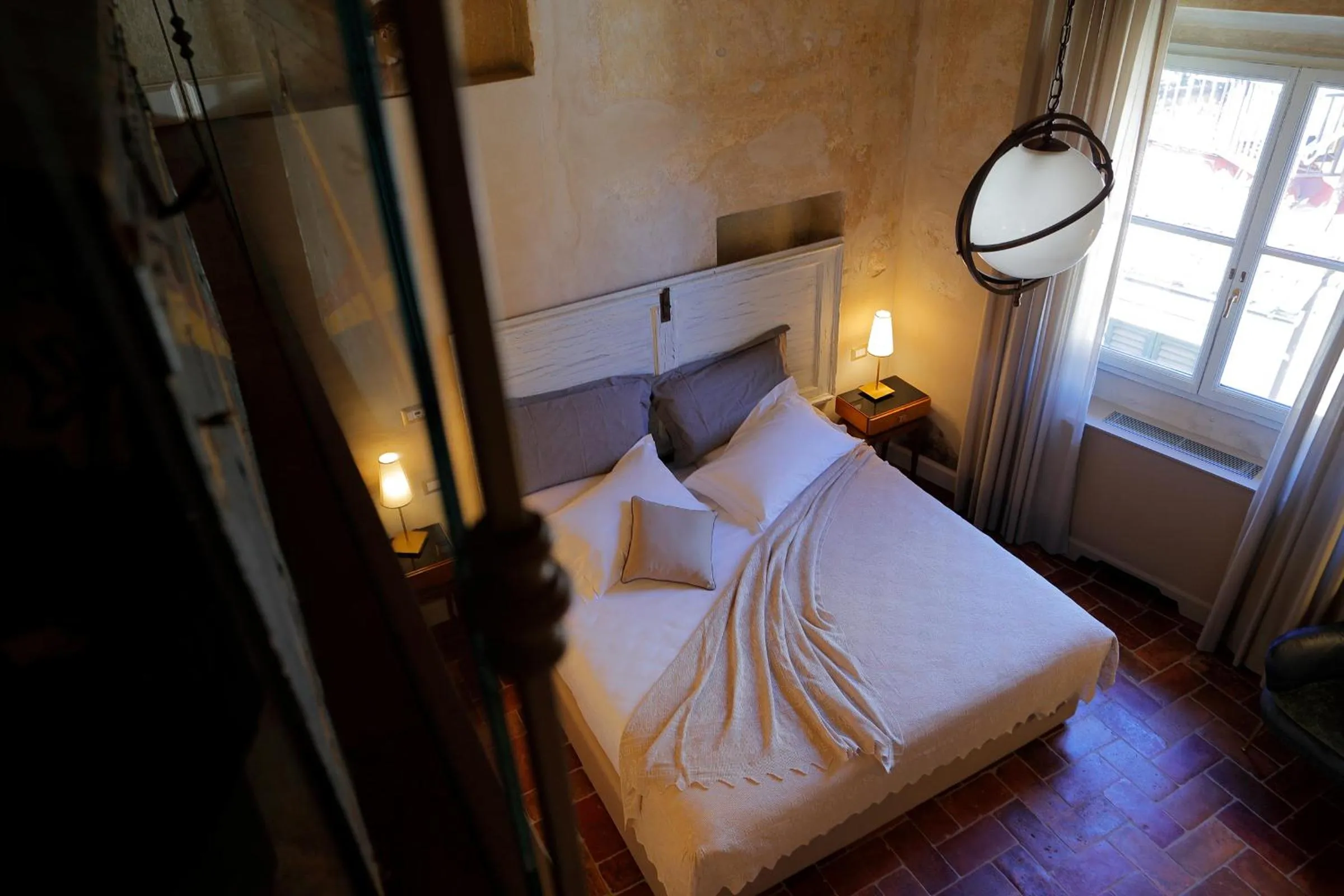 Bed in Residenza La Musa Amarcord