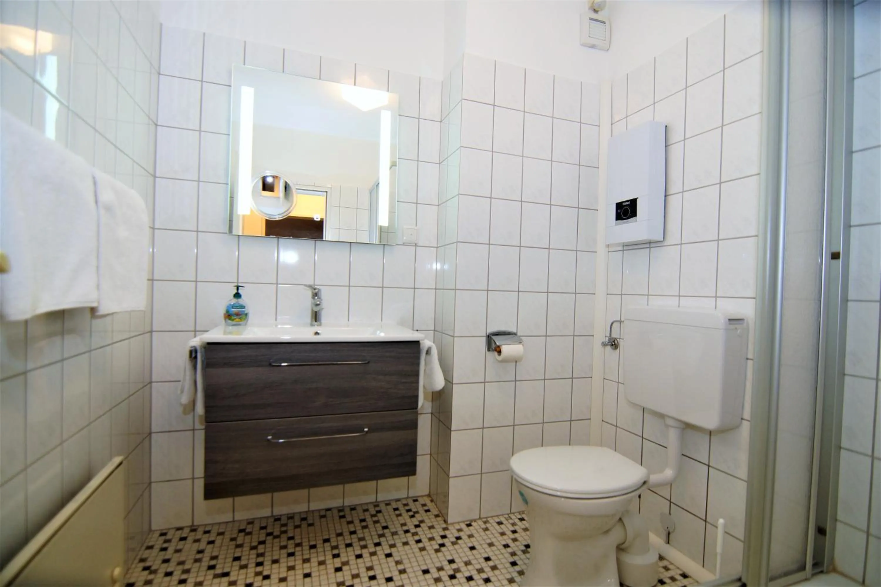 Bathroom in Komforthotel & Restaurant Riemann