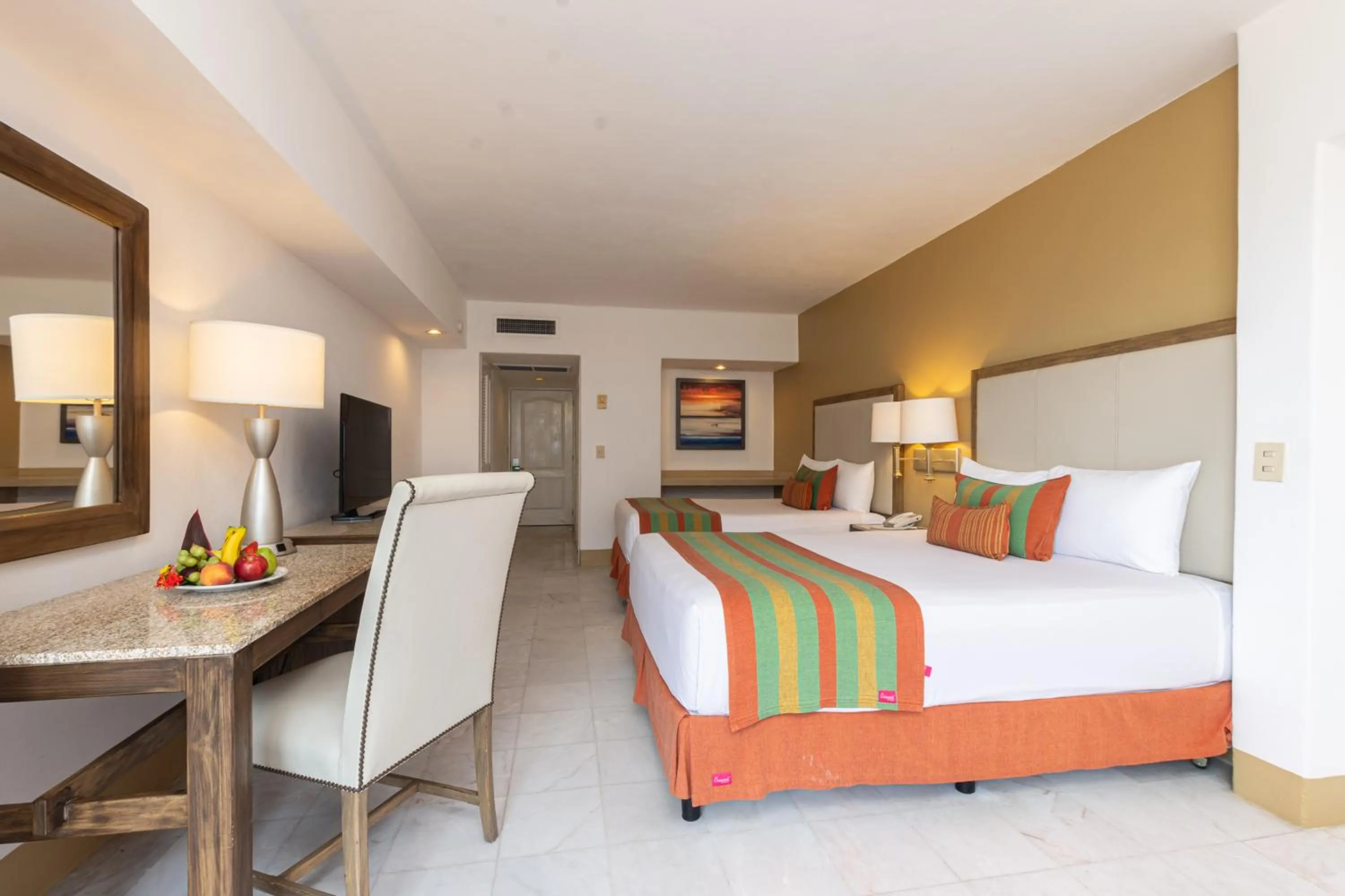 Photo of the whole room, Bed in Tesoro Ixtapa All Inclusive