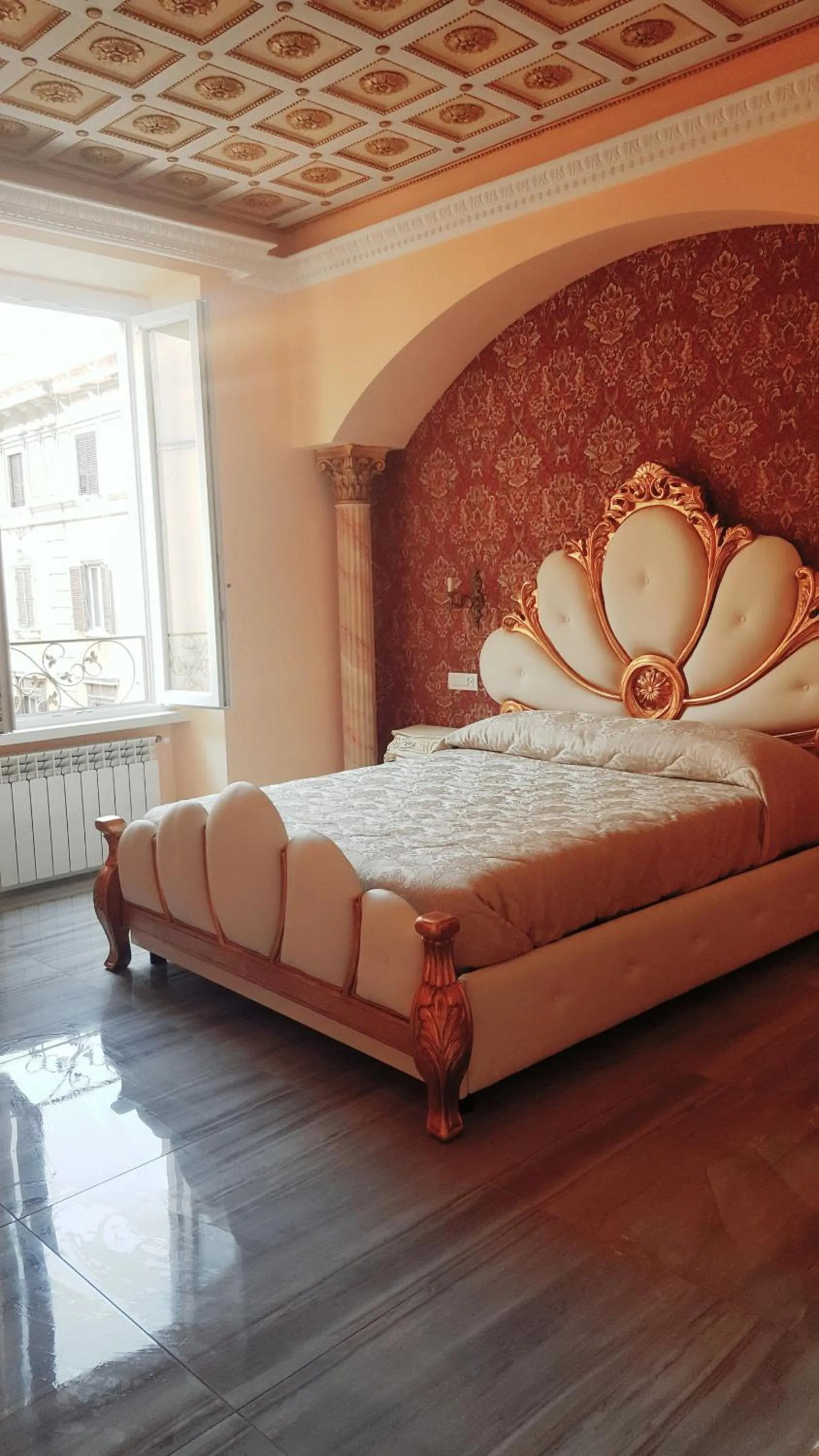 Decorative detail, Bed in Impero Vaticano Suites Guest House