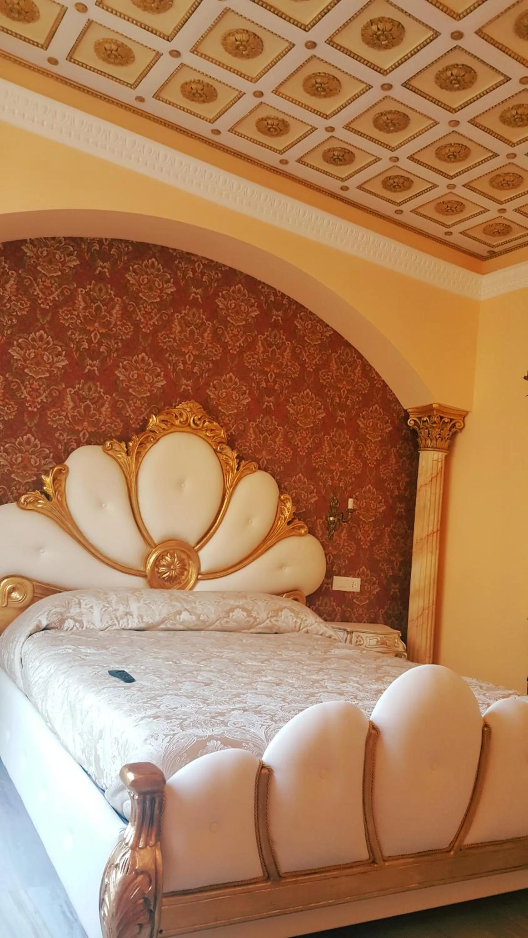 Decorative detail, Bed in Impero Vaticano Suites Guest House