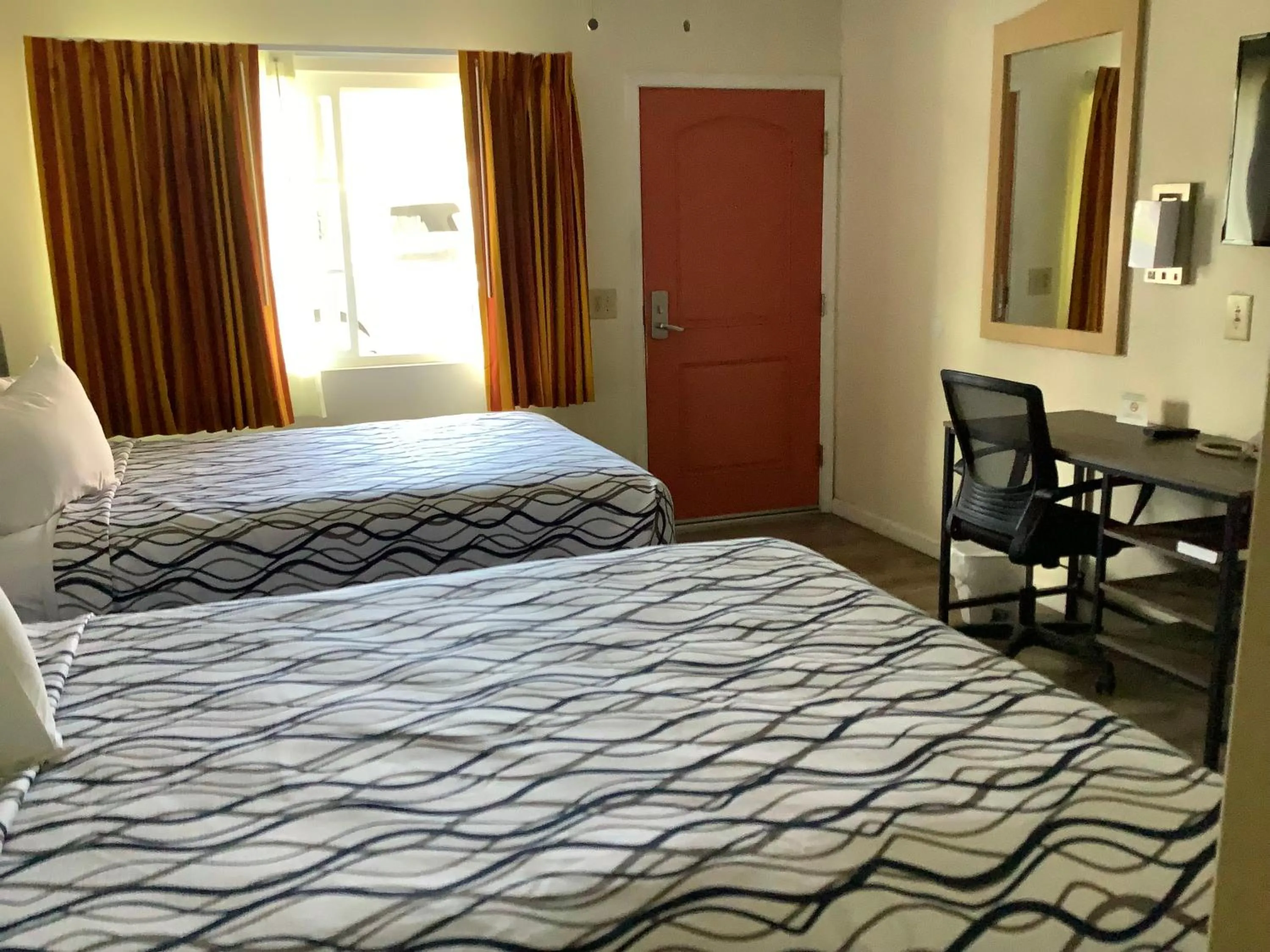 Bed in National 9 Motel