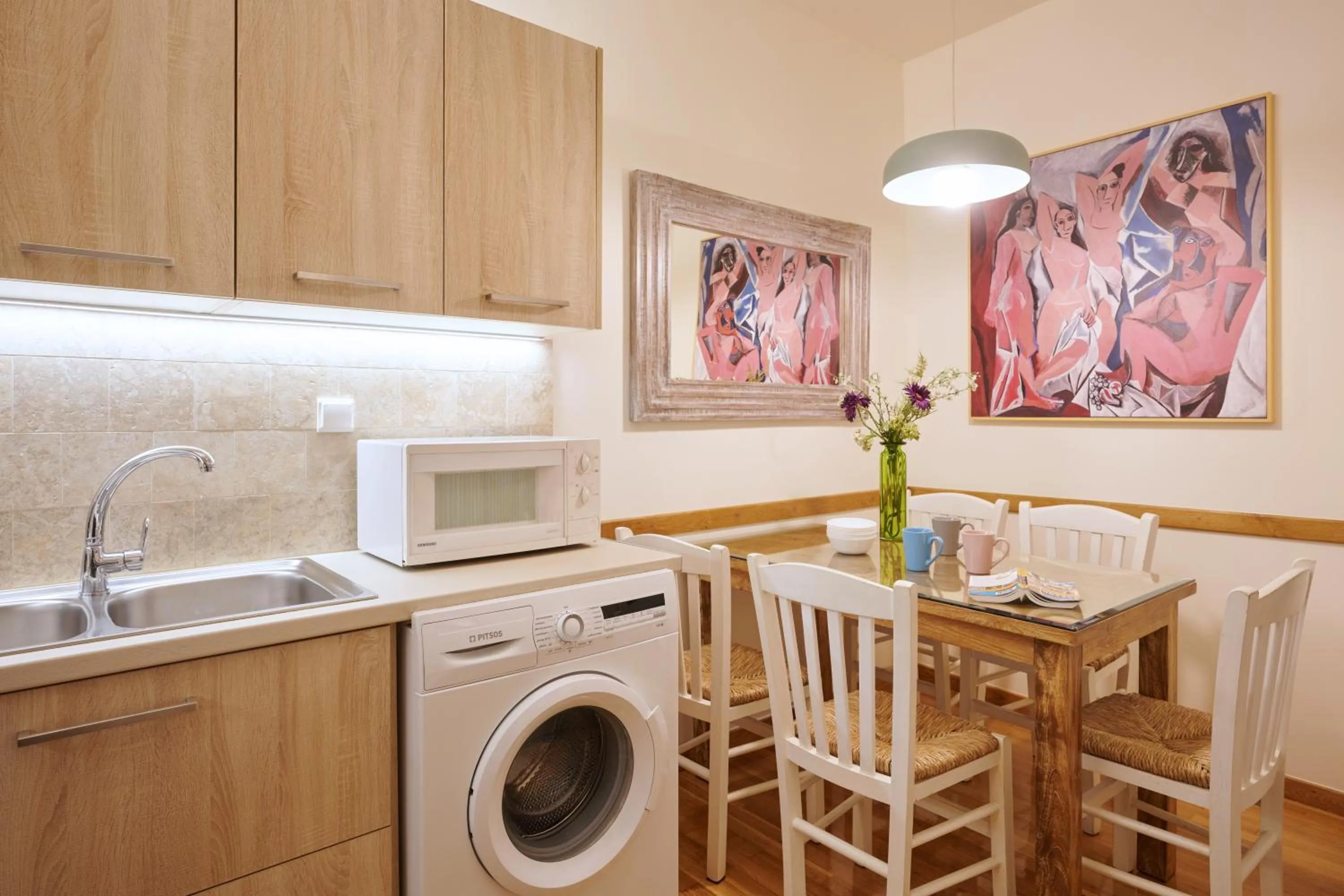 Kitchen or kitchenette in Rastoni Athens Suites near Acropolis