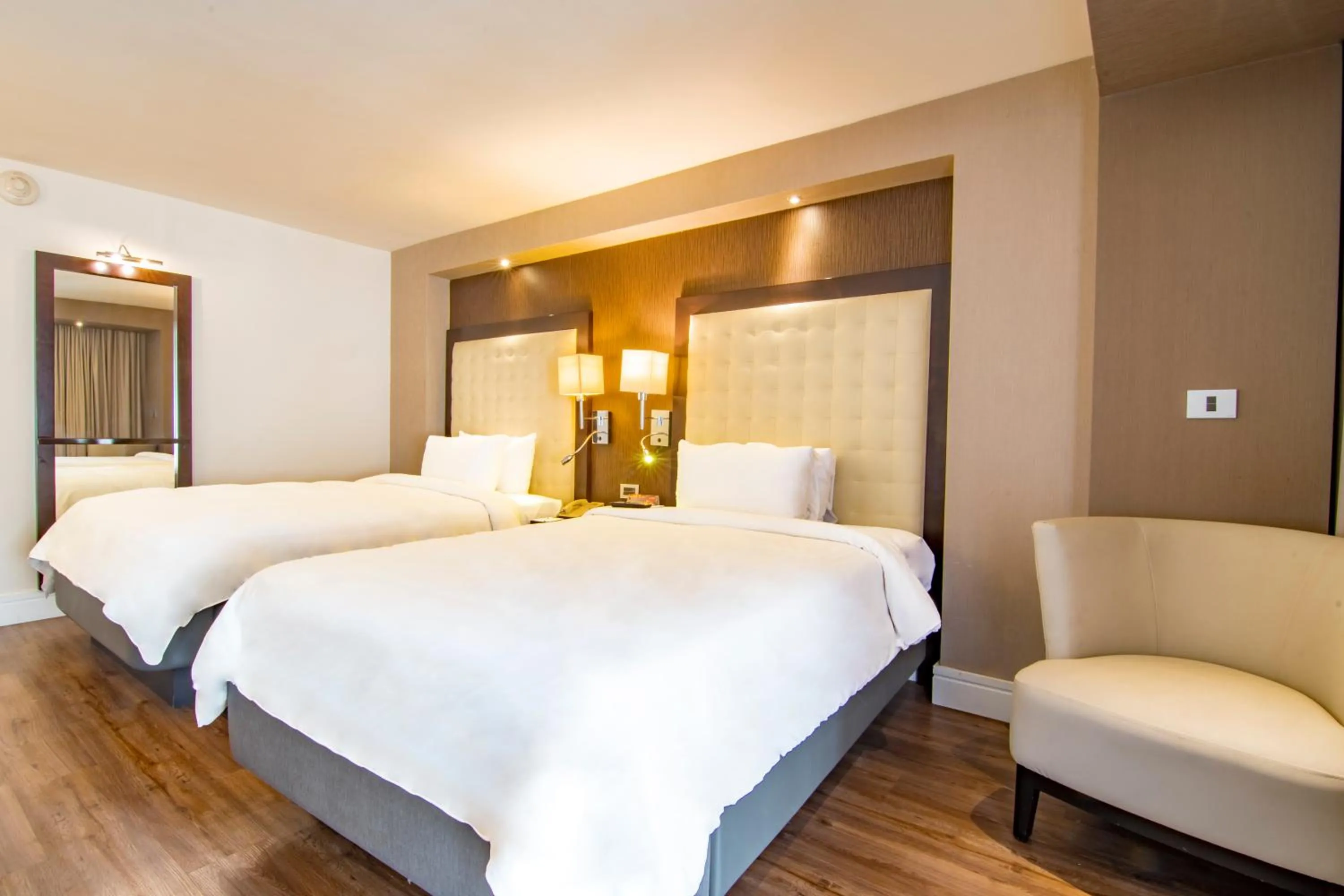 Bed in Hotel Lucerna Tijuana