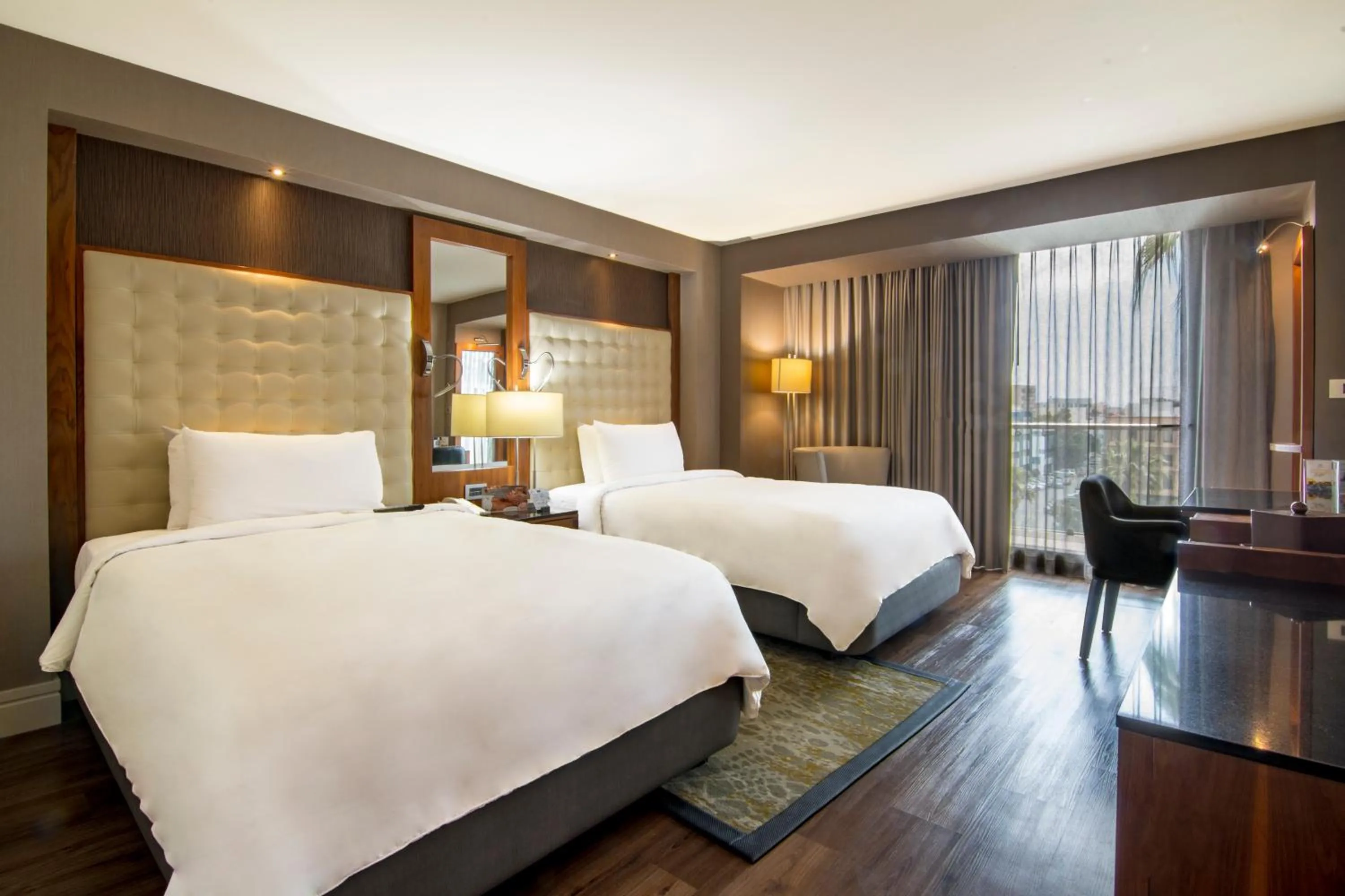 Bed in Hotel Lucerna Tijuana