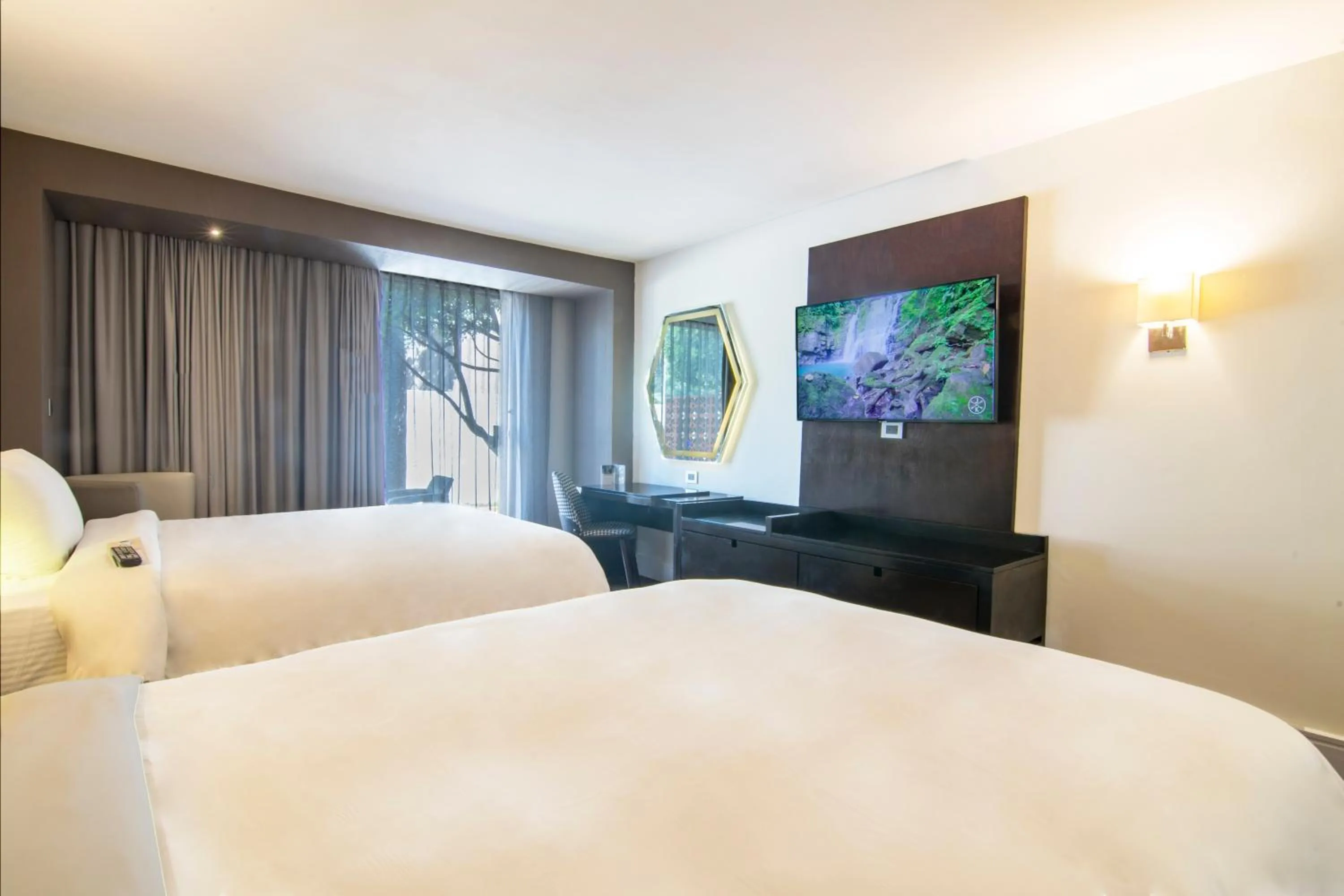 Bed in Hotel Lucerna Tijuana