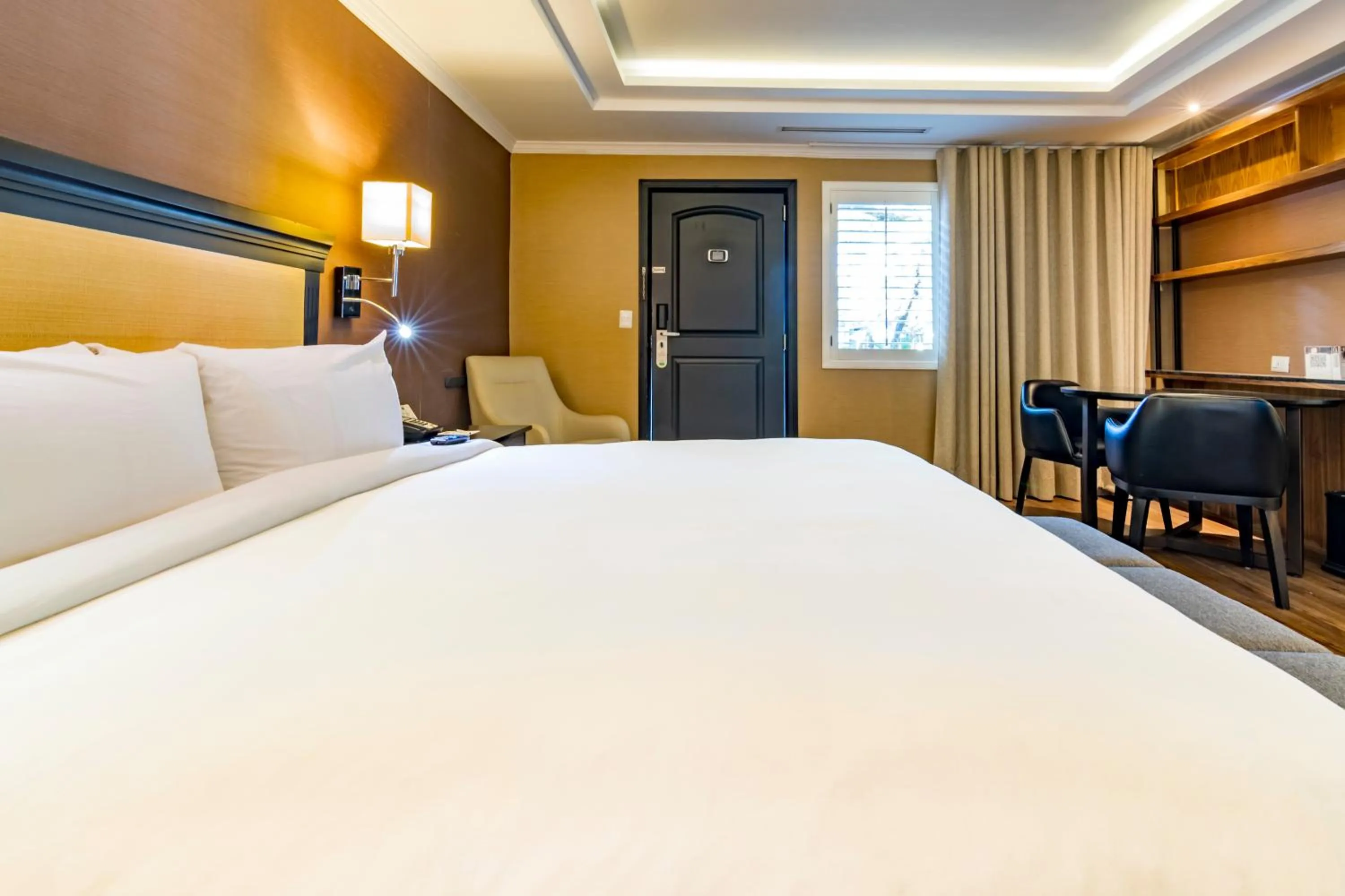 Bed in Hotel Lucerna Mexicali