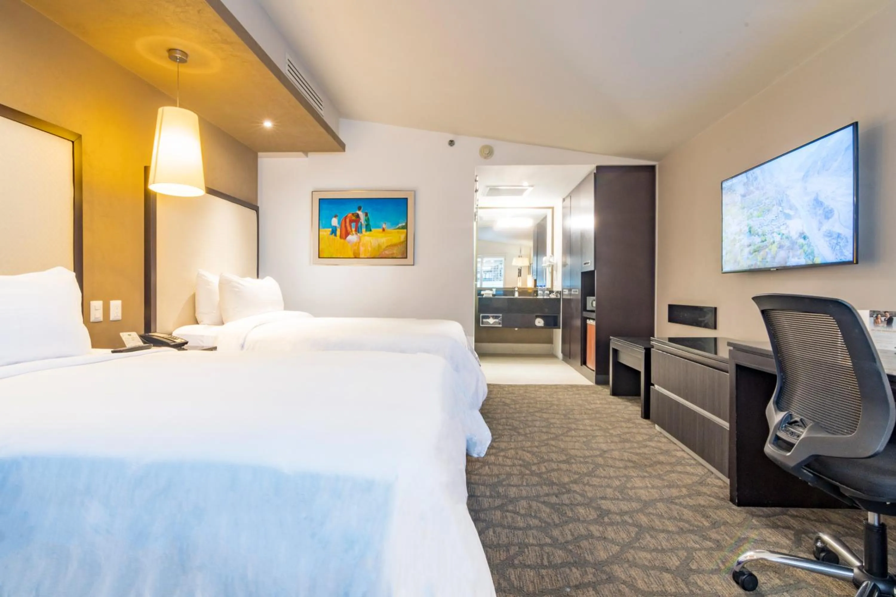 Bed in Hotel Lucerna Mexicali