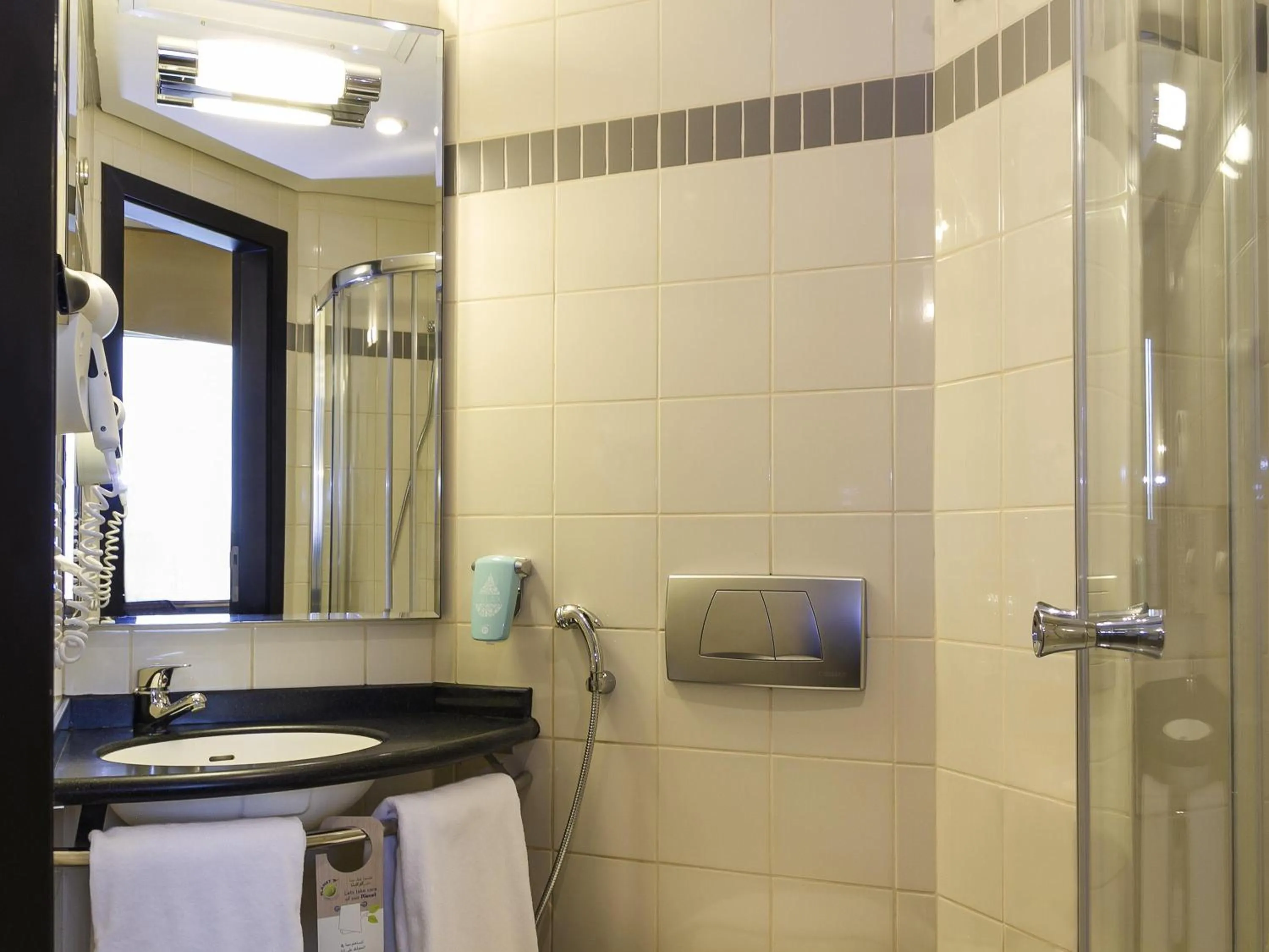 Bedroom in ibis Sharq