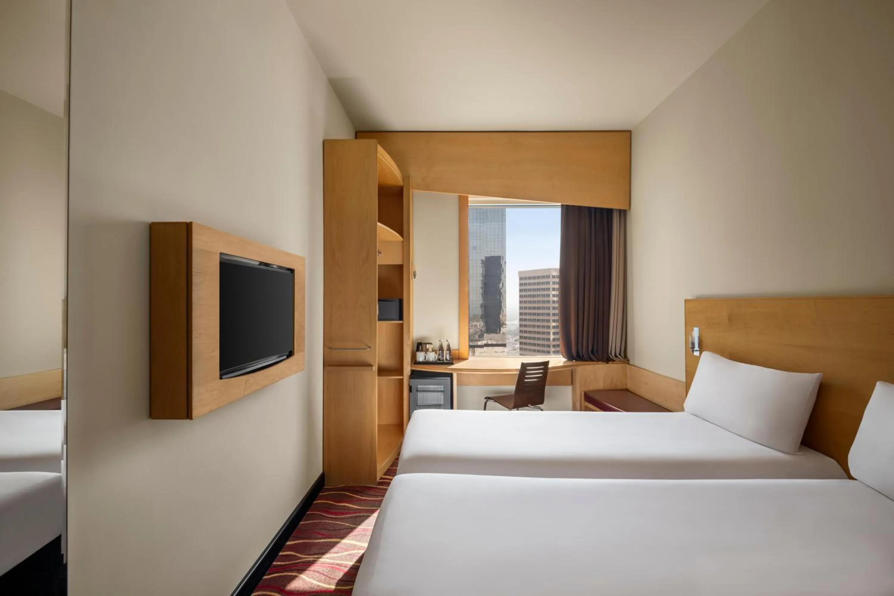 Bed in ibis Sharq