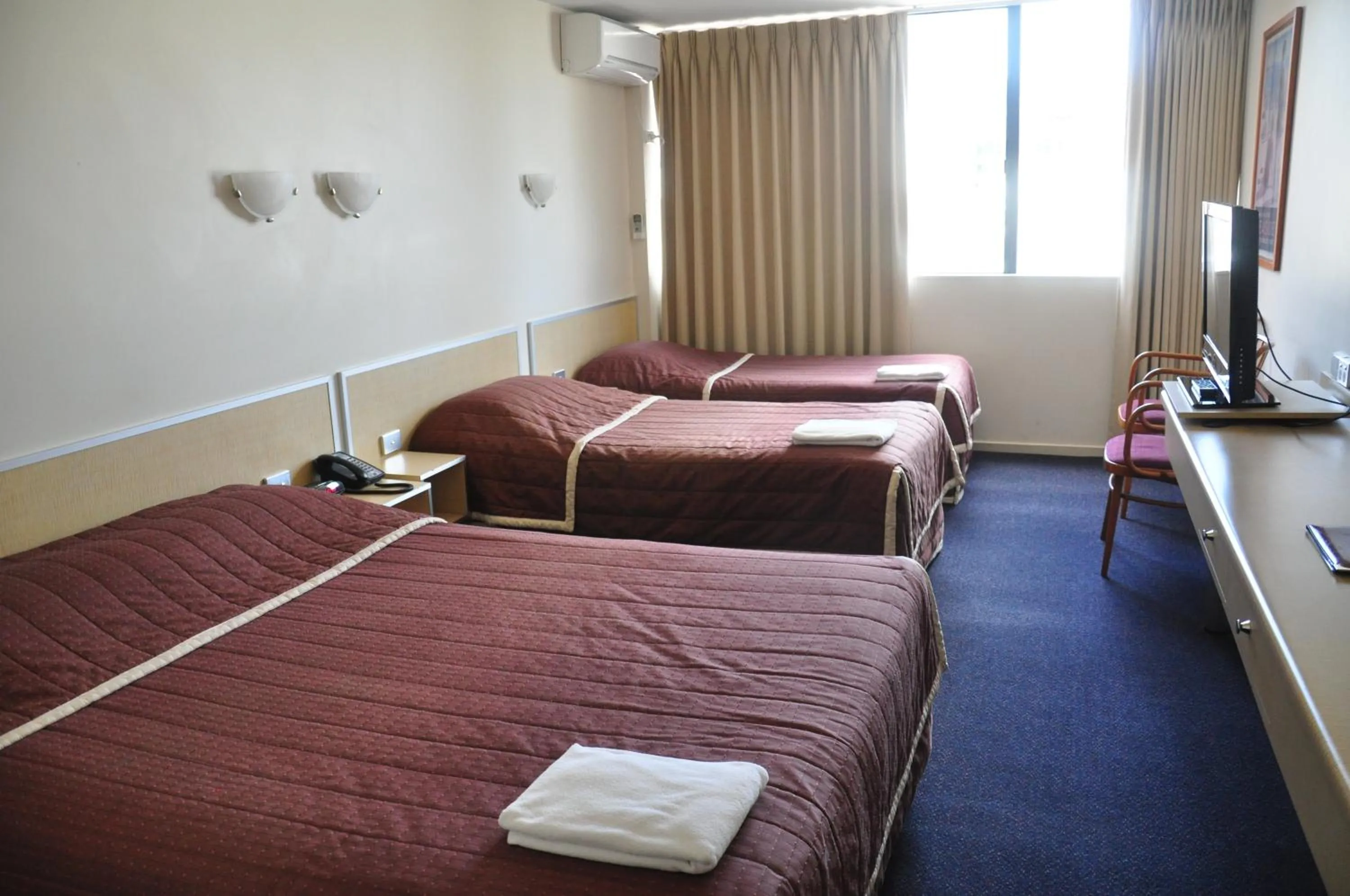 Bed in City Park Hotel