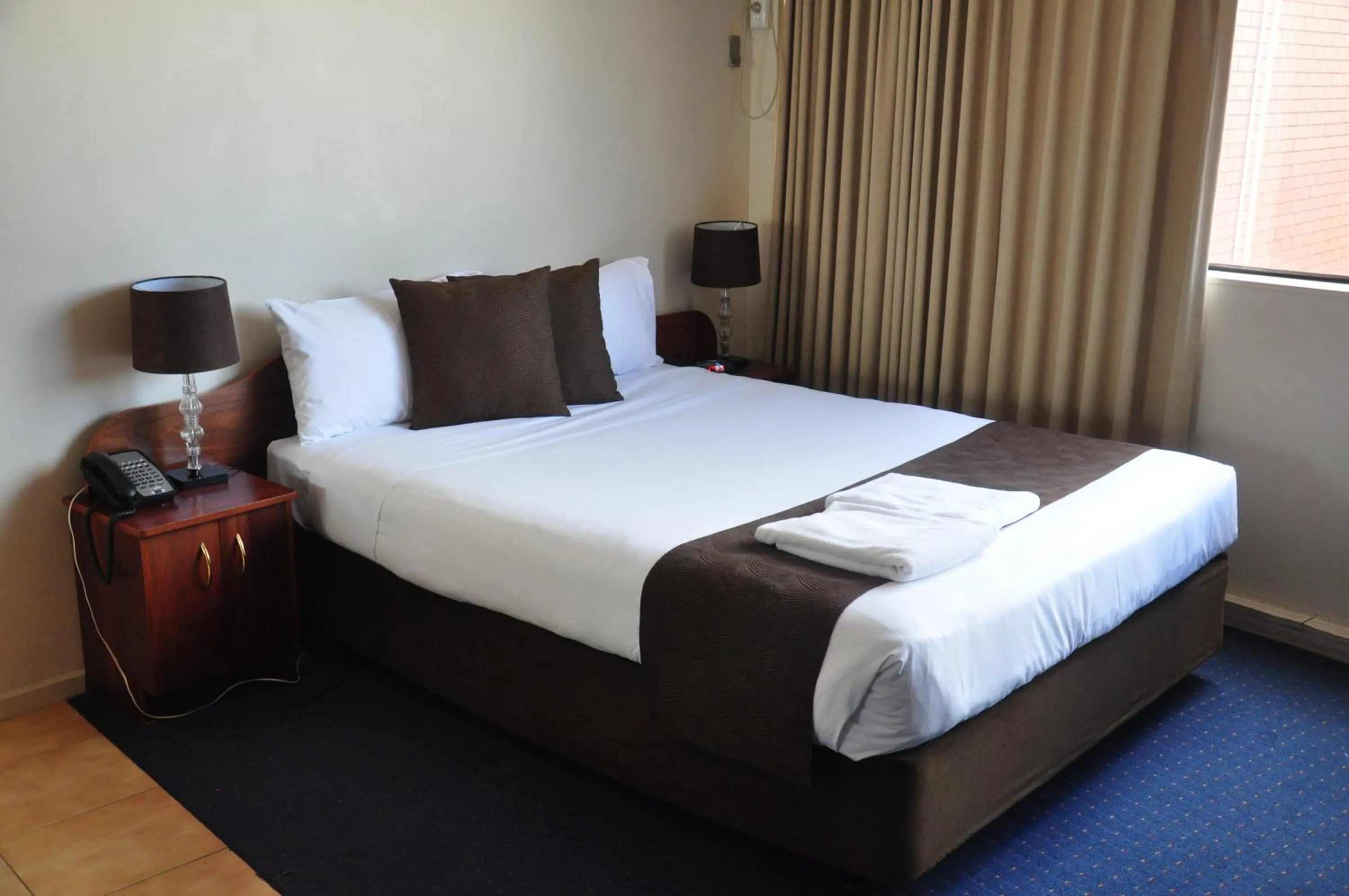 Bed in City Park Hotel