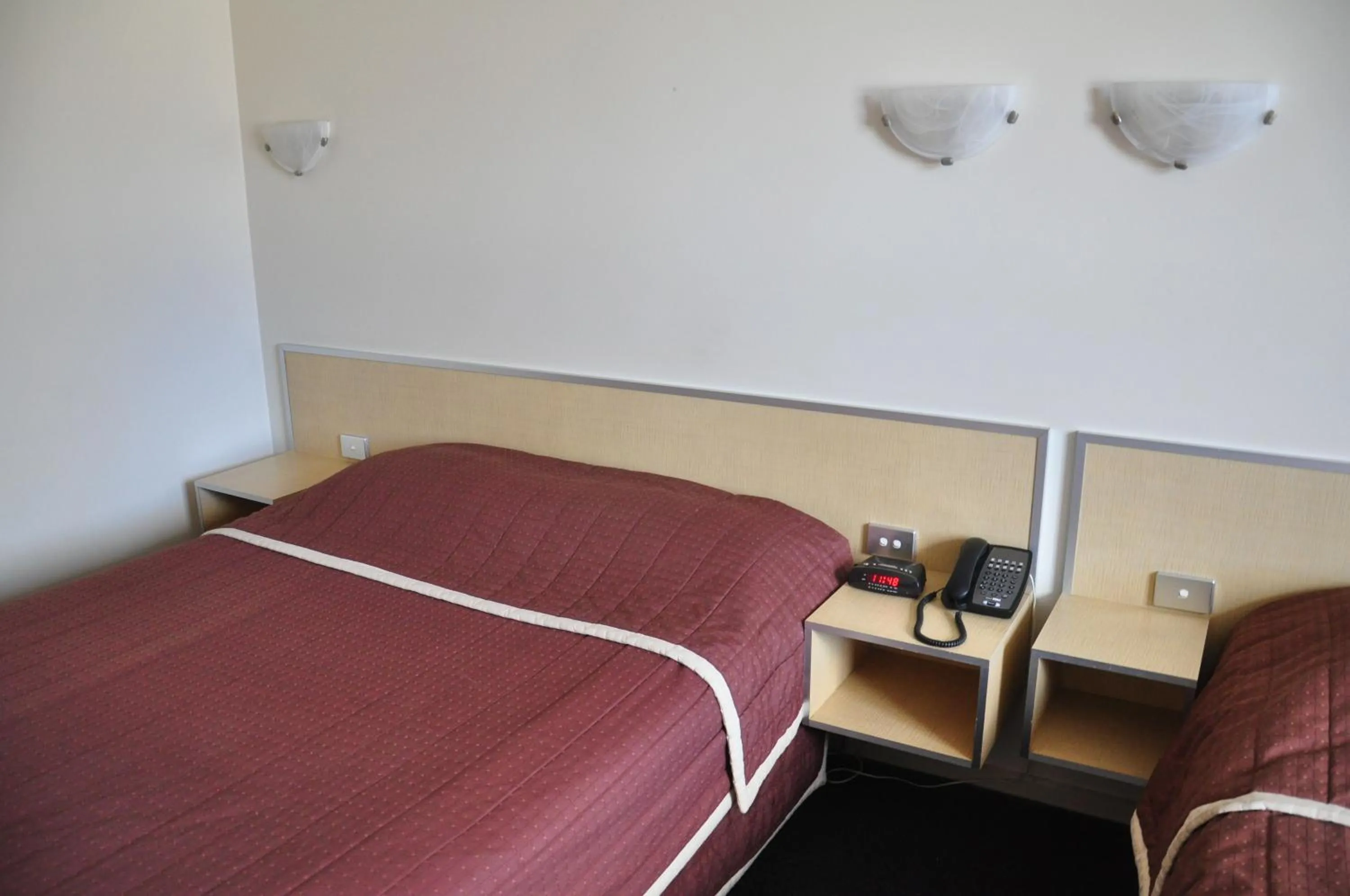 Bed in City Park Hotel