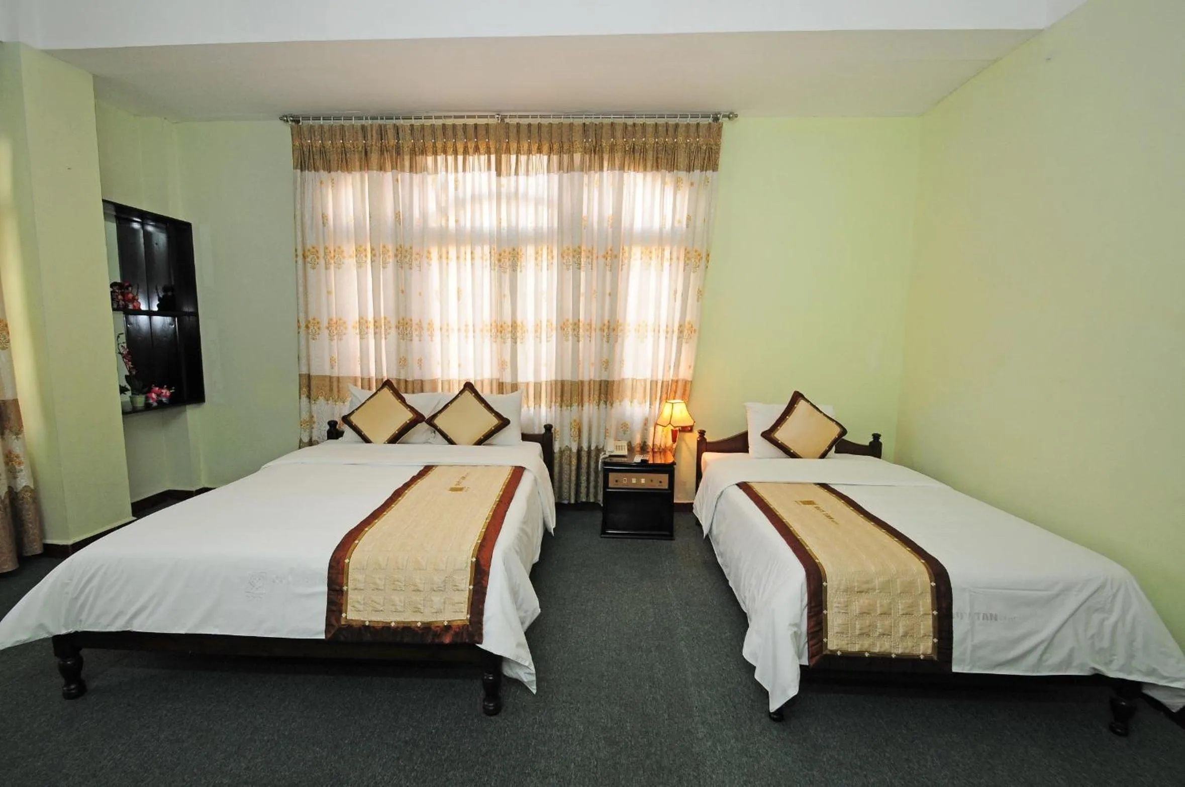 Bed in Duy Tan Hotel