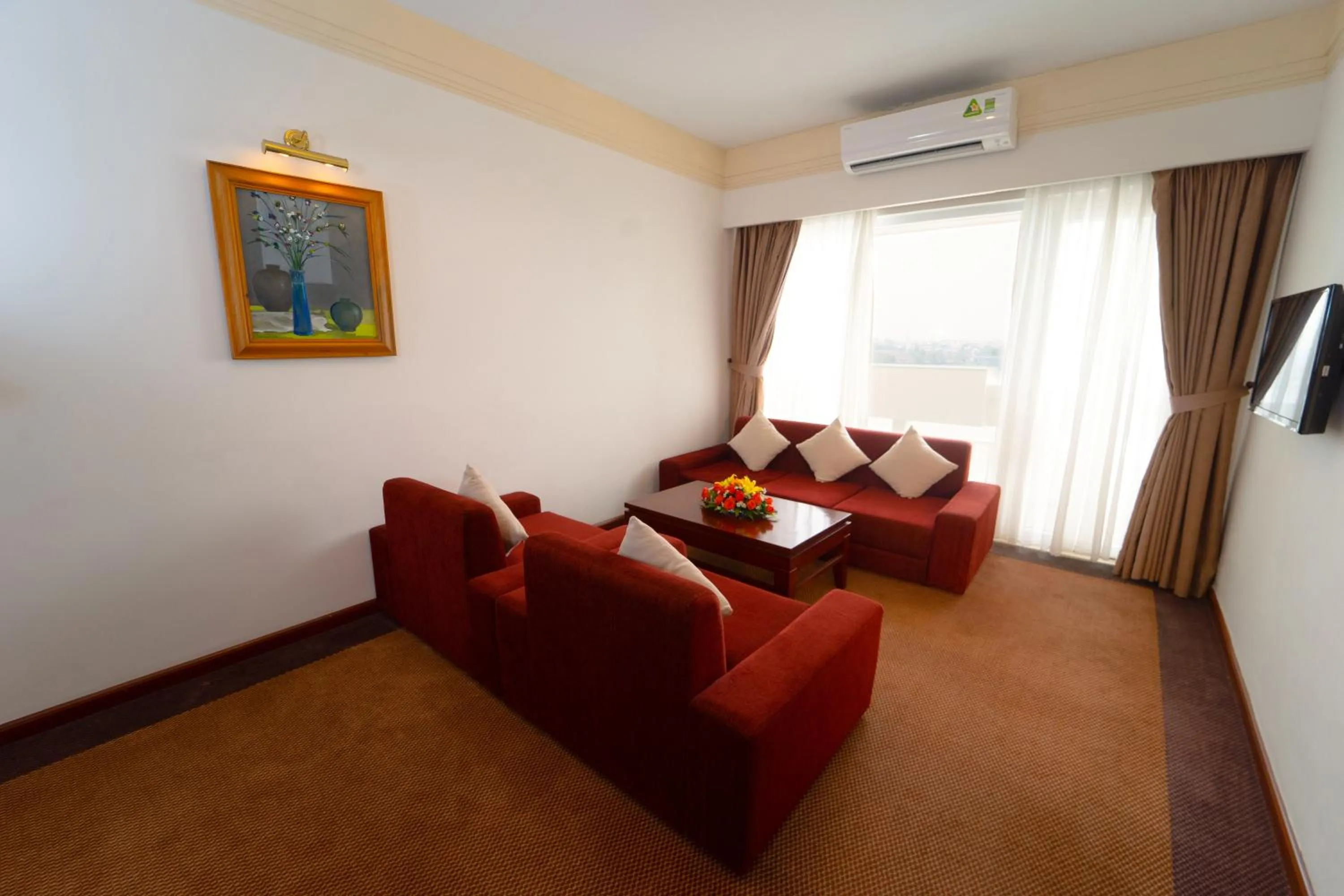 Living room in Century Riverside Hotel Hue