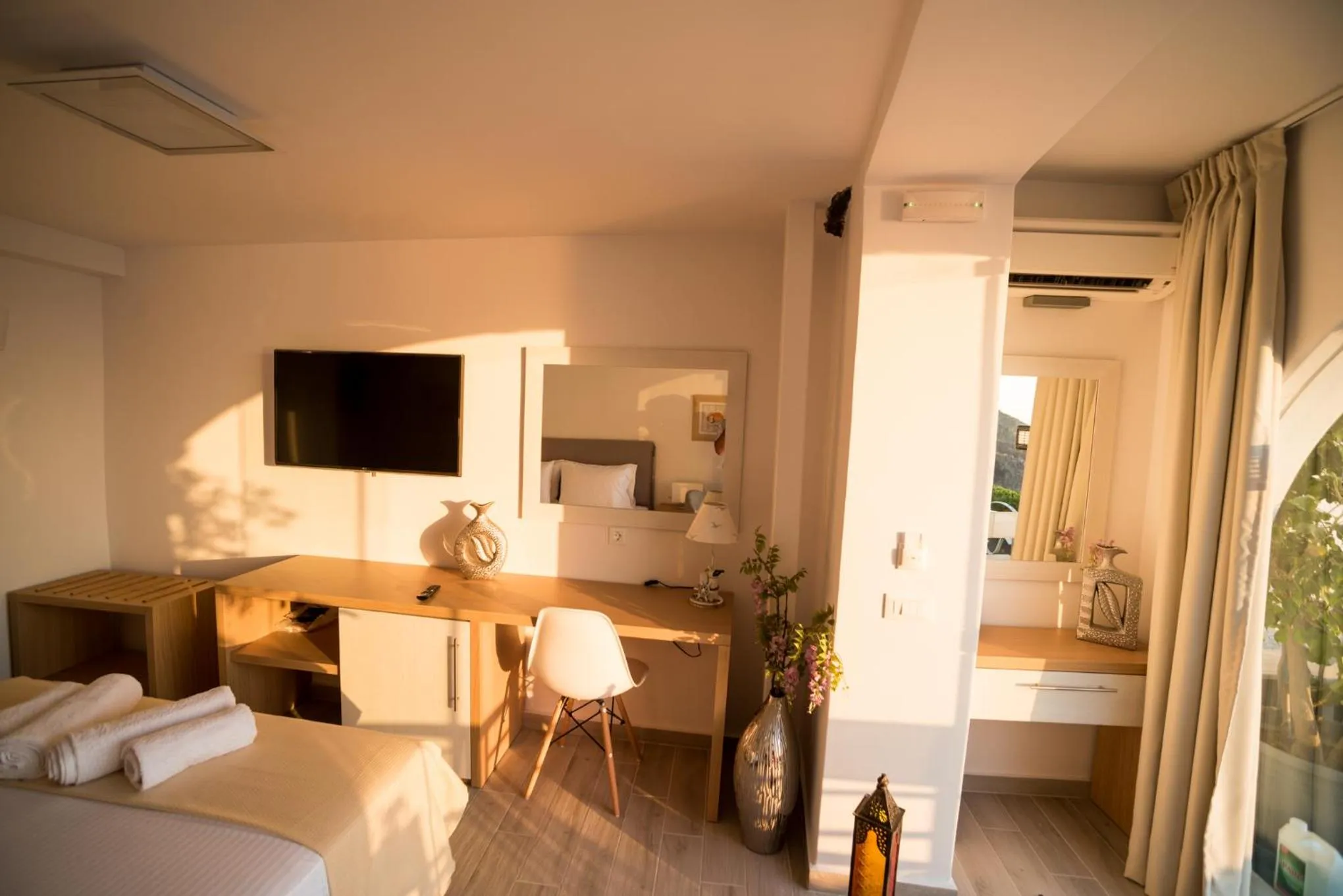 Decorative detail, Bed in Kratiras View Luxury Suites