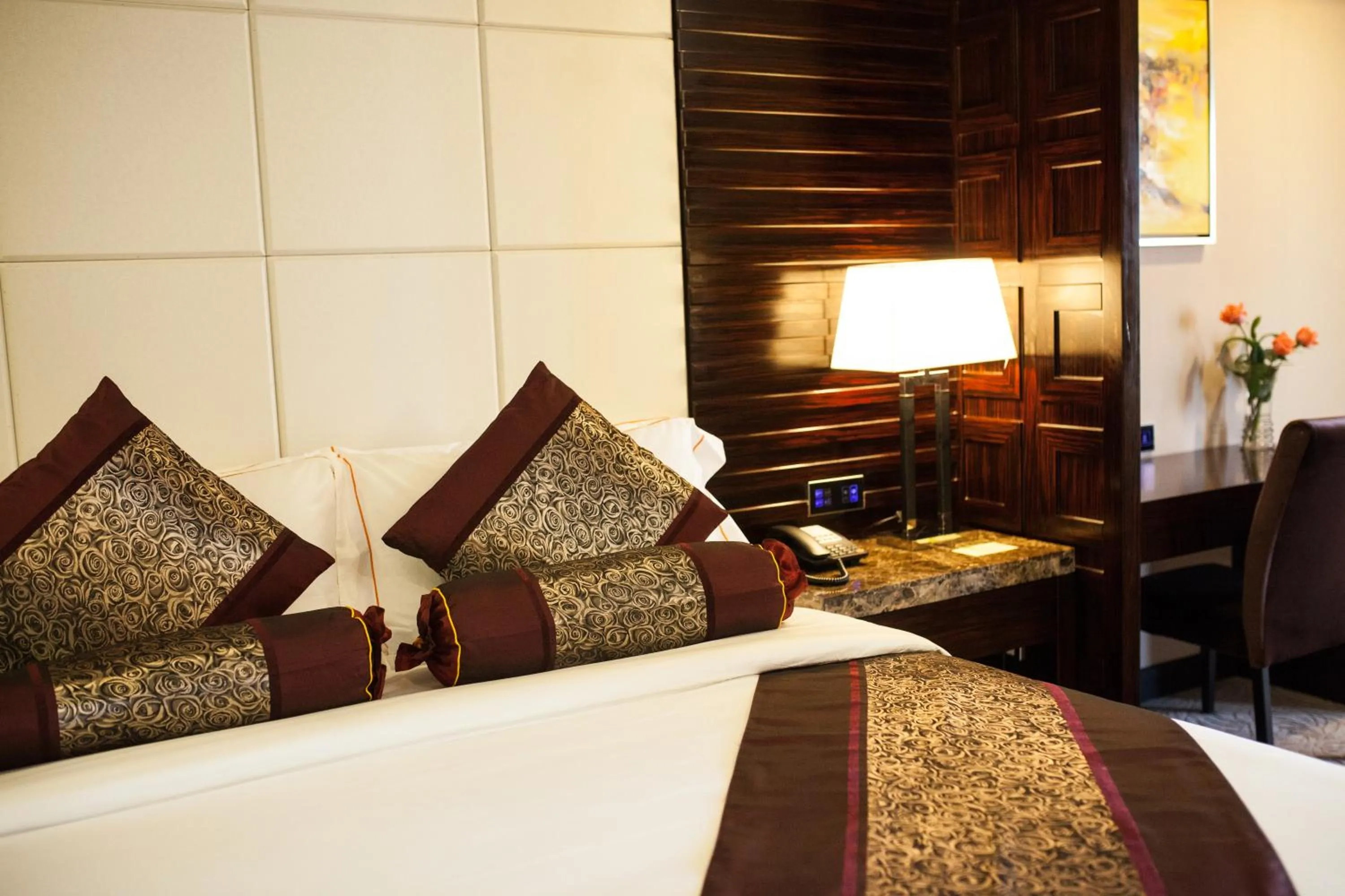 Bed in Royale Signature Hotel