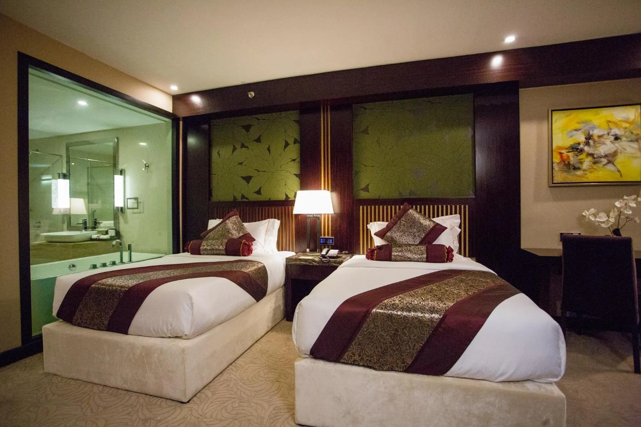 Bed in Royale Signature Hotel