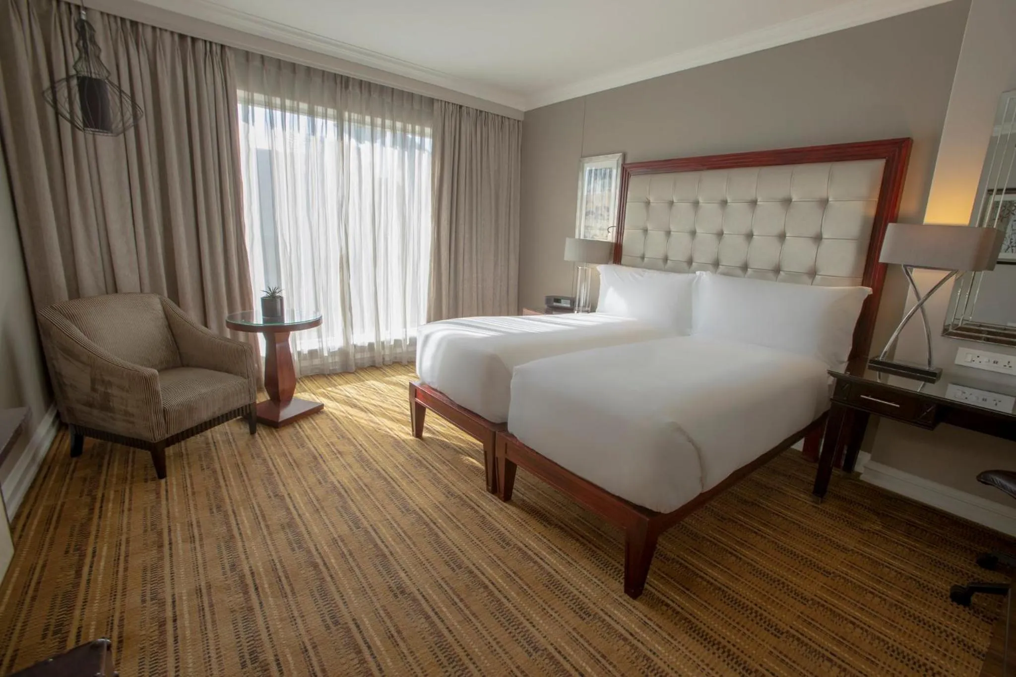 Photo of the whole room, Bed in InterContinental Johannesburg OR Tambo Airport Hotel by IHG