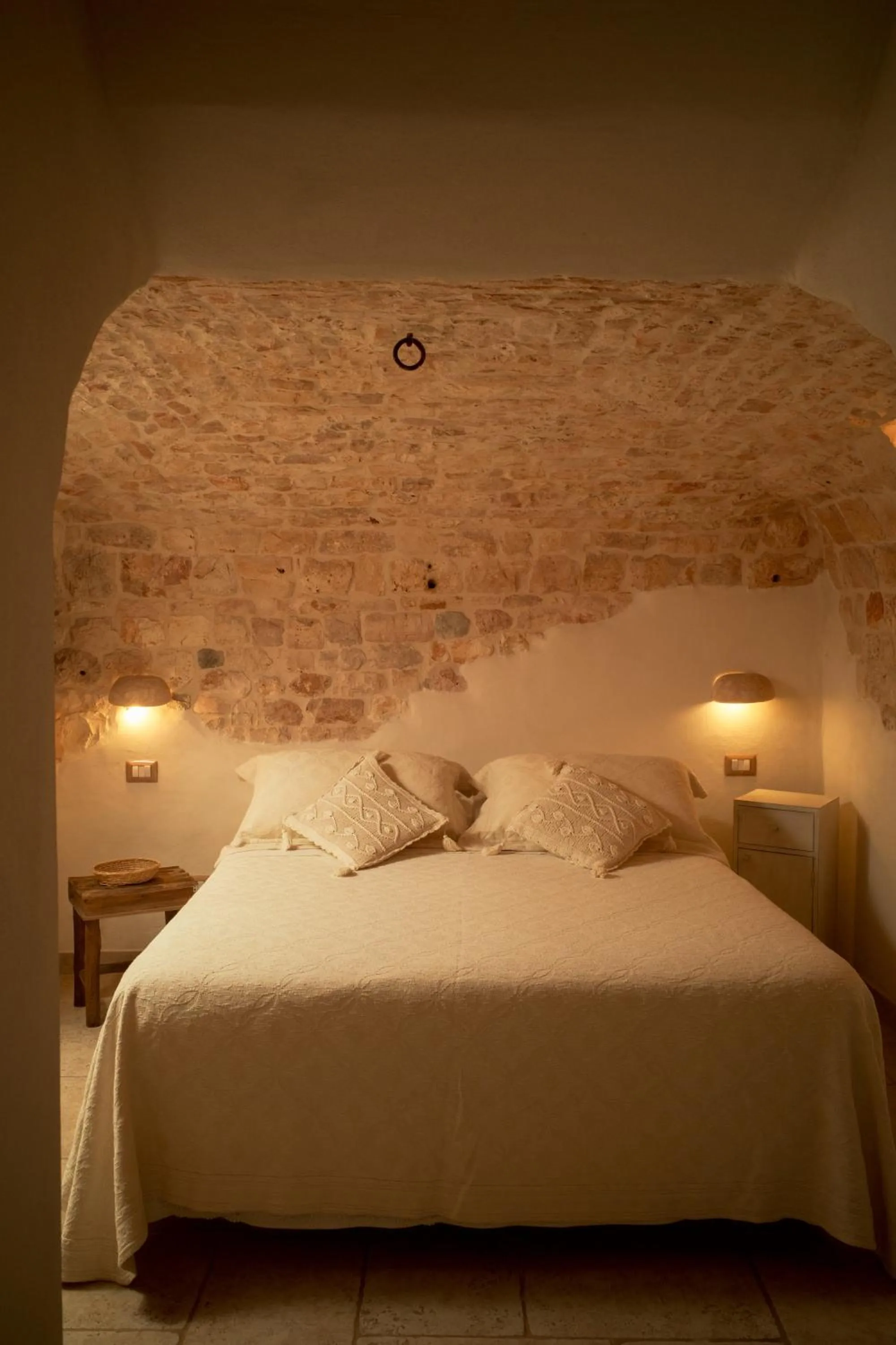 Bed in I Trulli del Tupparello