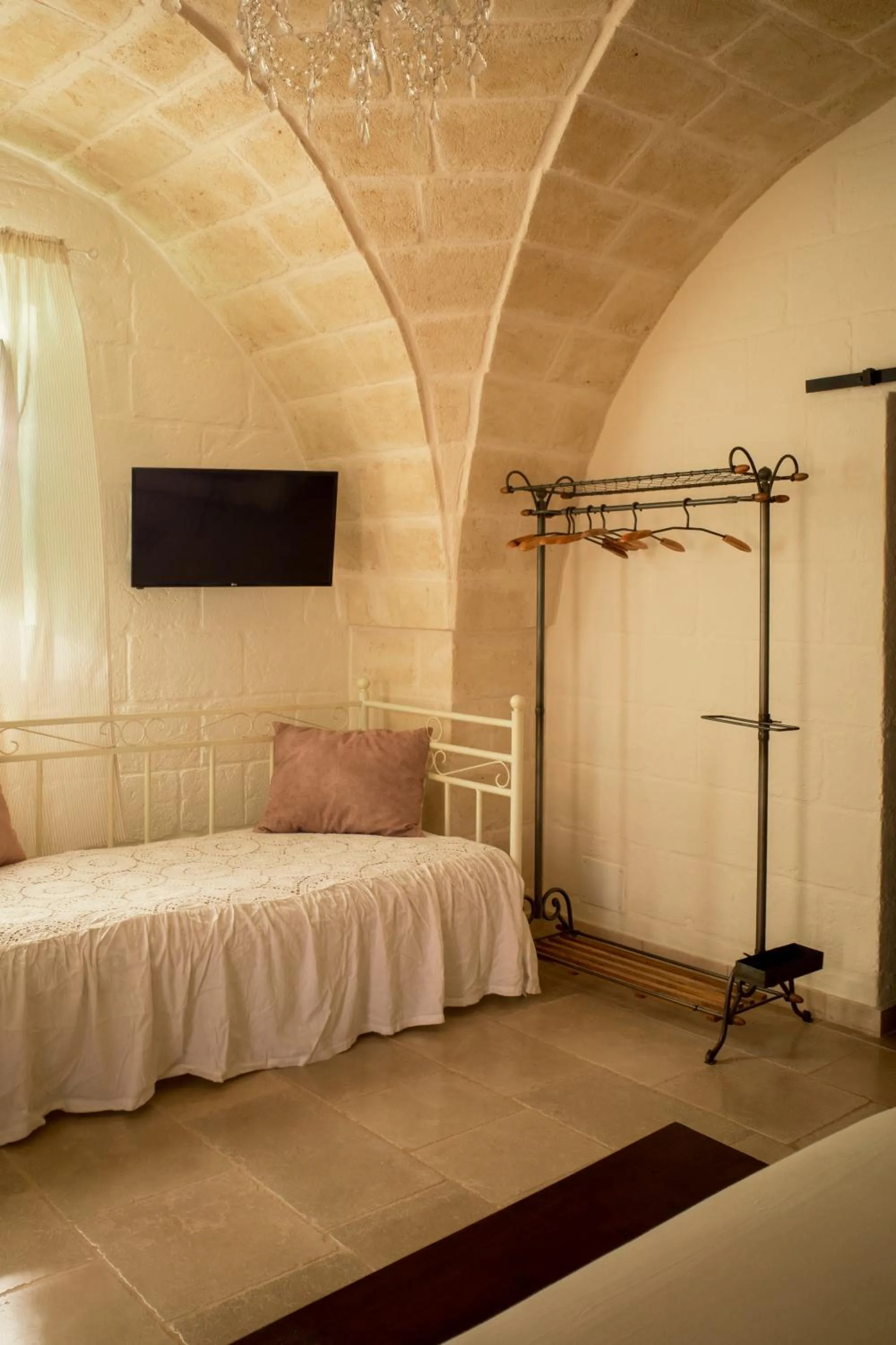 Bed in I Trulli del Tupparello