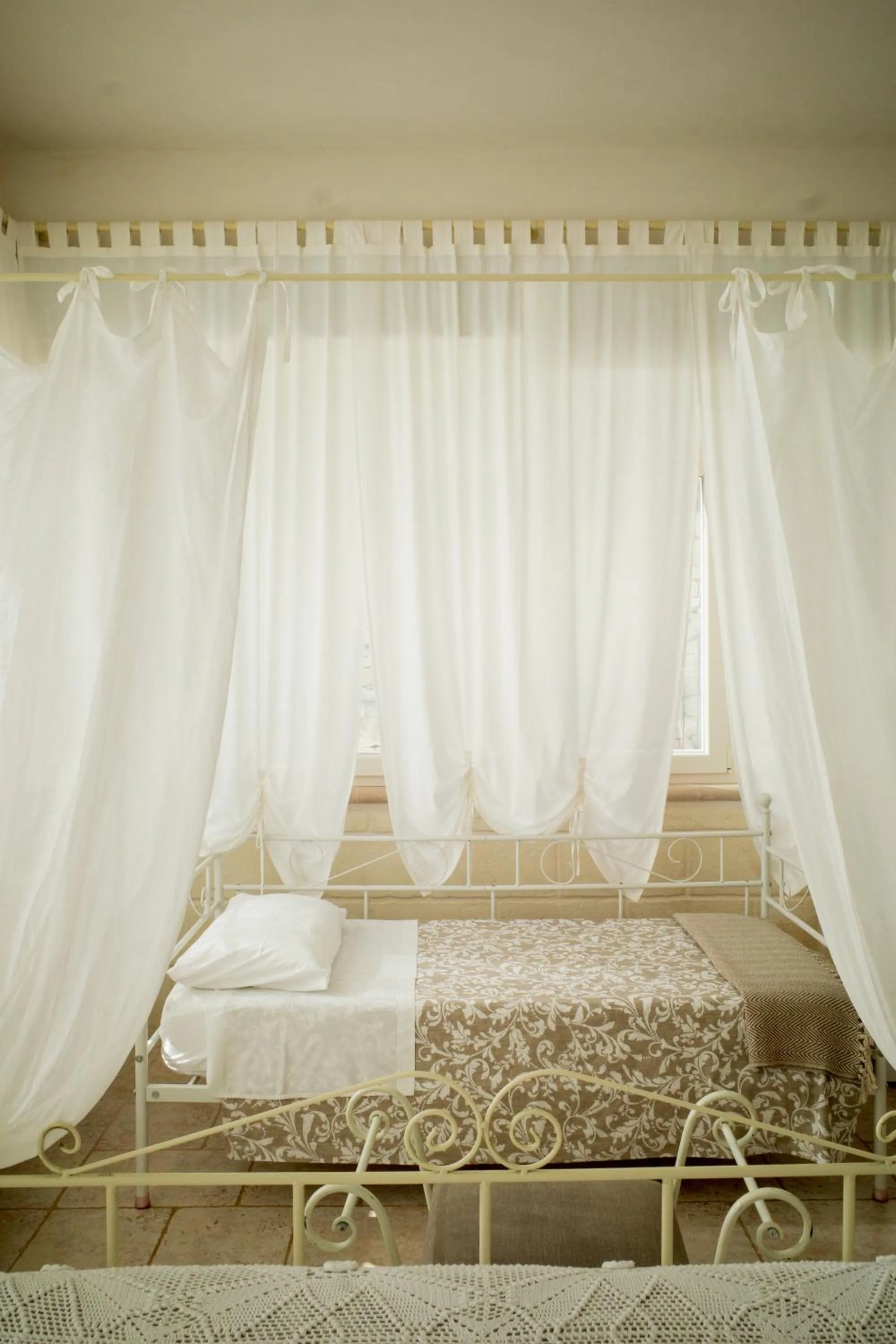 Bed in I Trulli del Tupparello