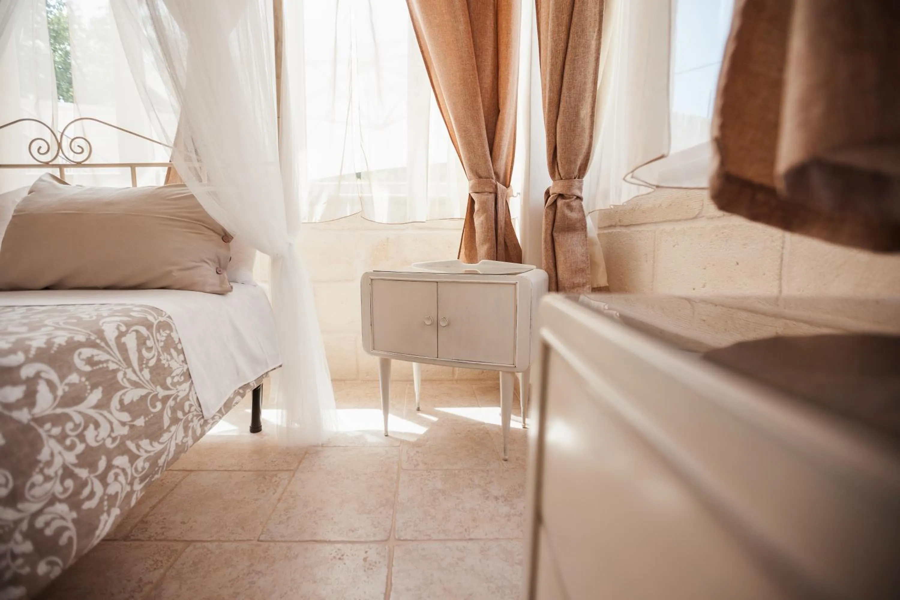 Bed in I Trulli del Tupparello