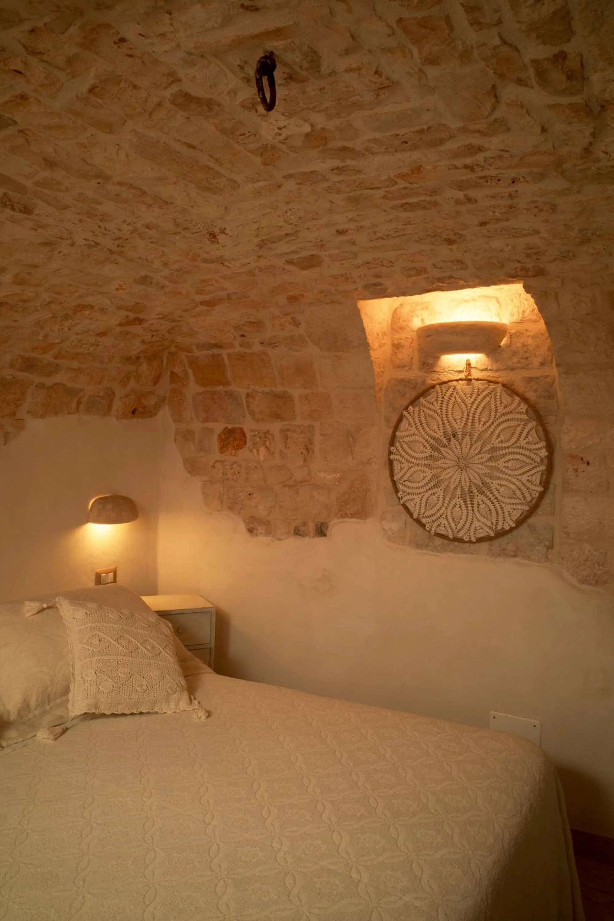 Bed in I Trulli del Tupparello