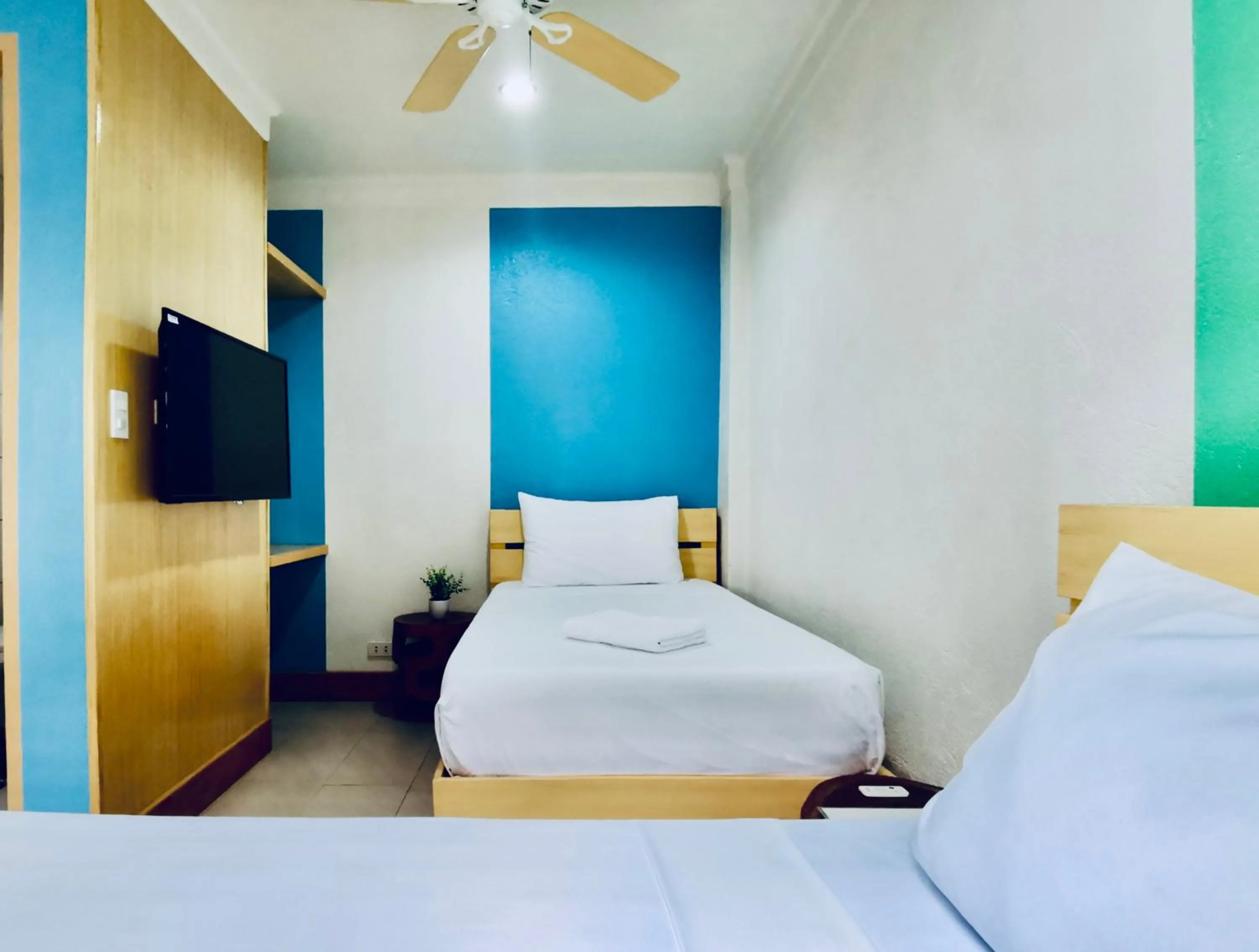 Bed in Den Den Guesthouse