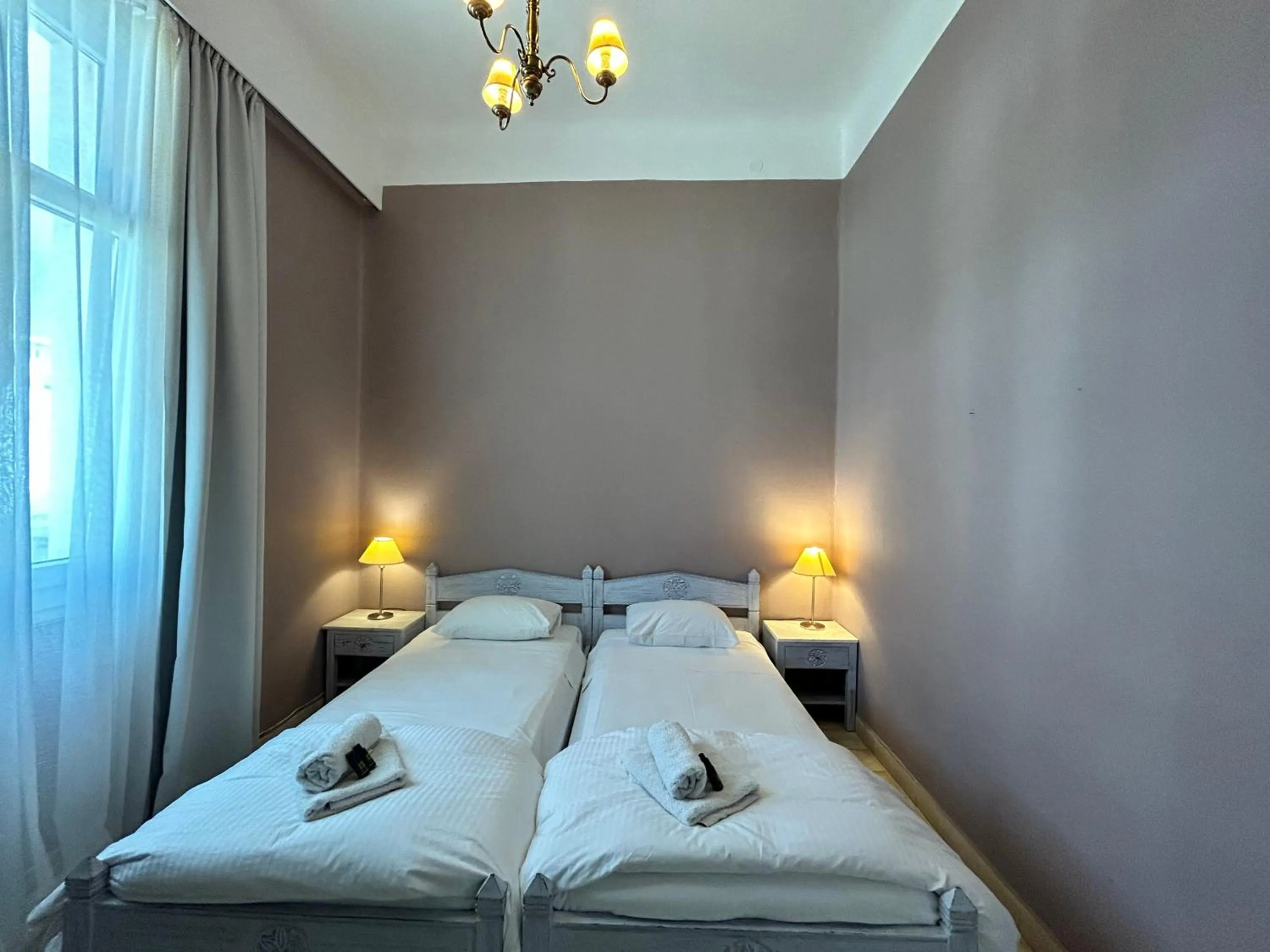 Bed in Tinion Urban Hotel