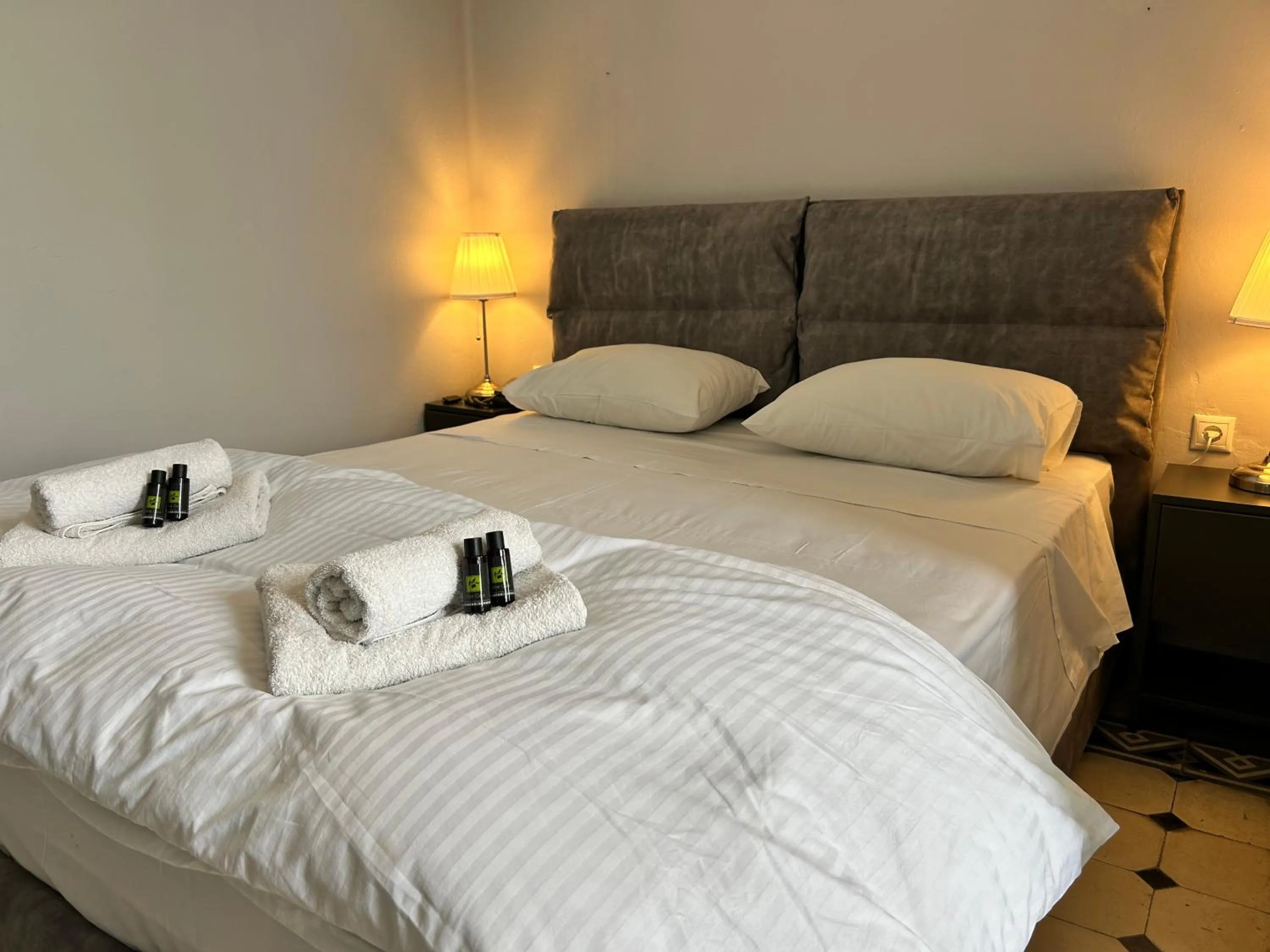 Bed in Tinion Urban Hotel