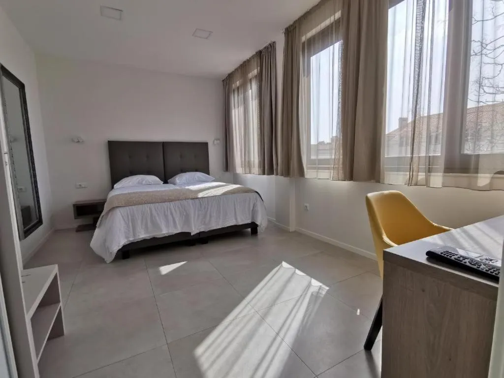 Bed in Luxury Rooms Pino